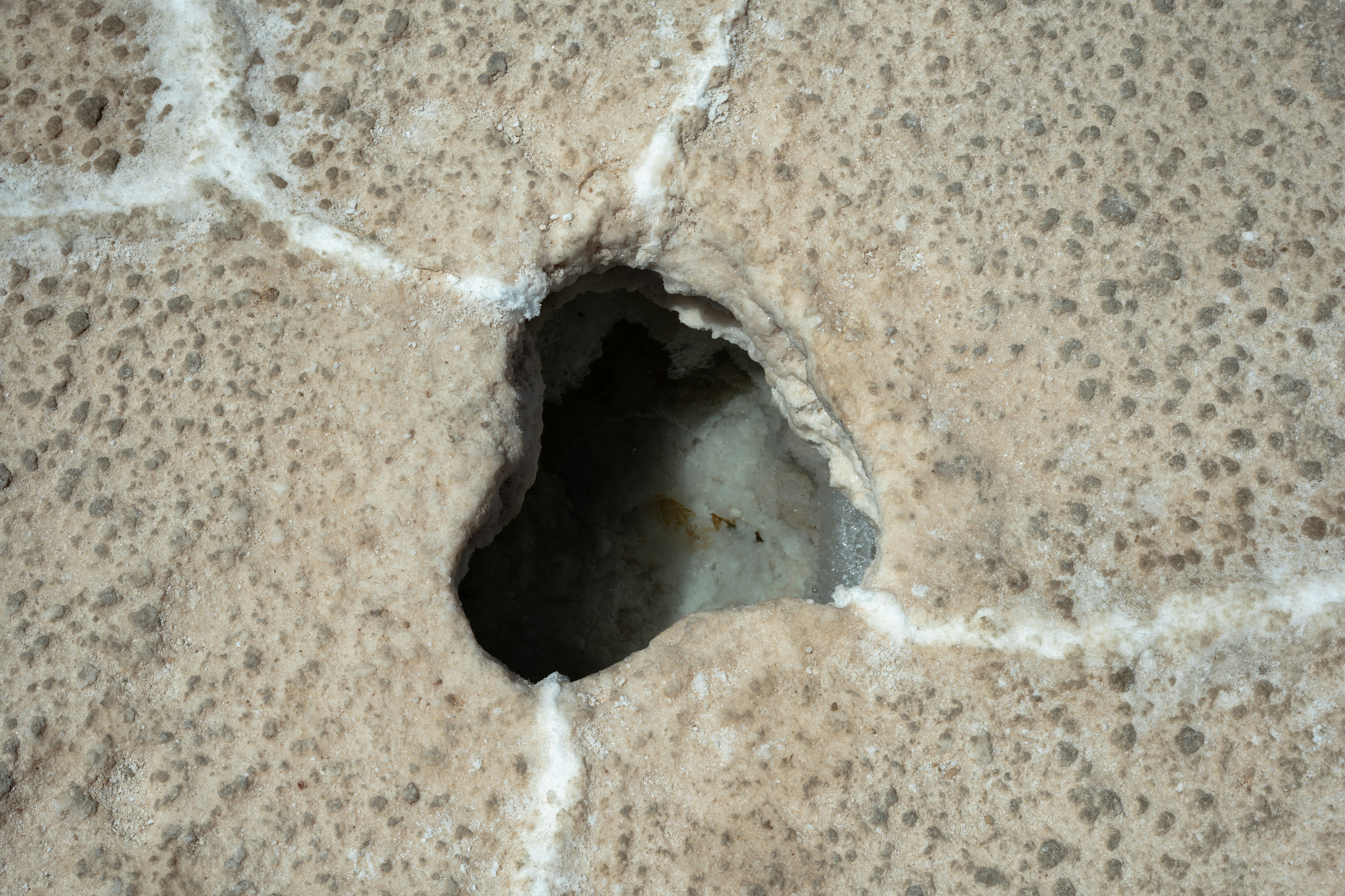Salinas Grandes, Argentina - Natural hexagonal salt formations on the surface of Salinas Grandes, shaped by extreme dryness and sun.