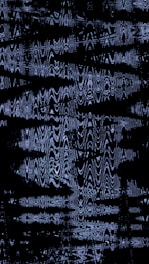 Abstract pattern of wavy lines on black background