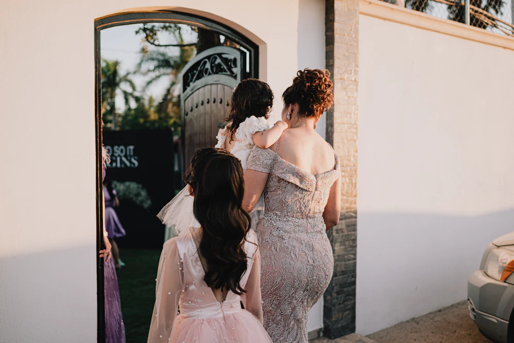Carer with children at a wedding