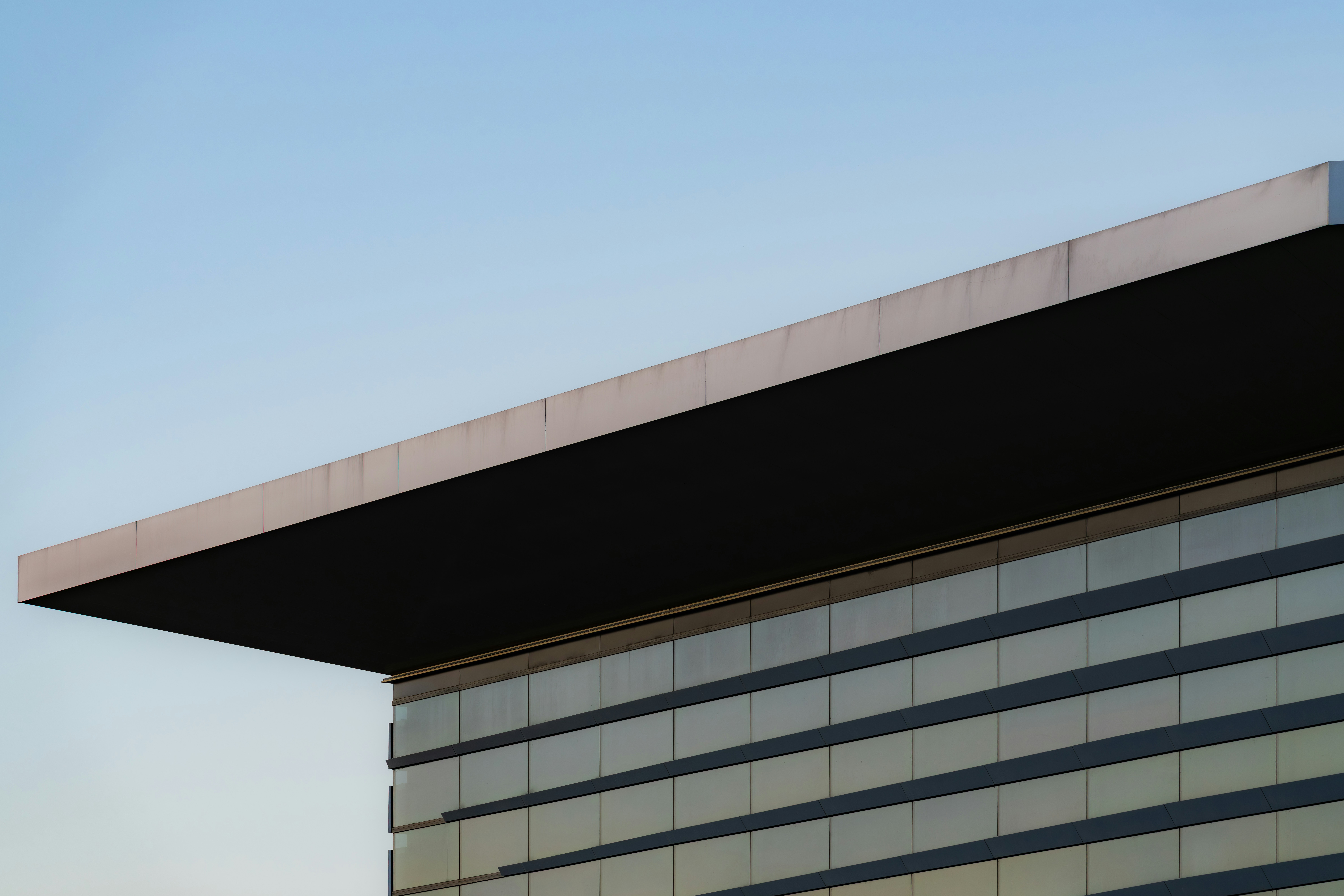 A modern commercial building exterior with sleek architectural features - Commercial Property Upgrades