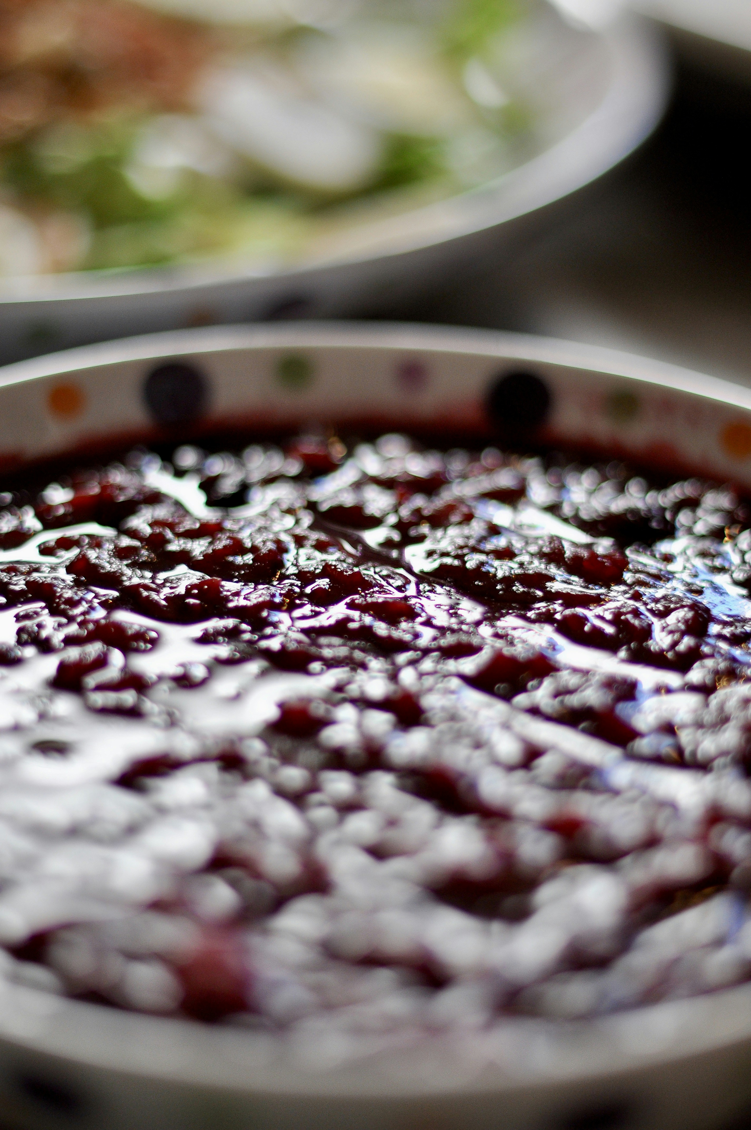 Close-up of a bowl of dark berry compote