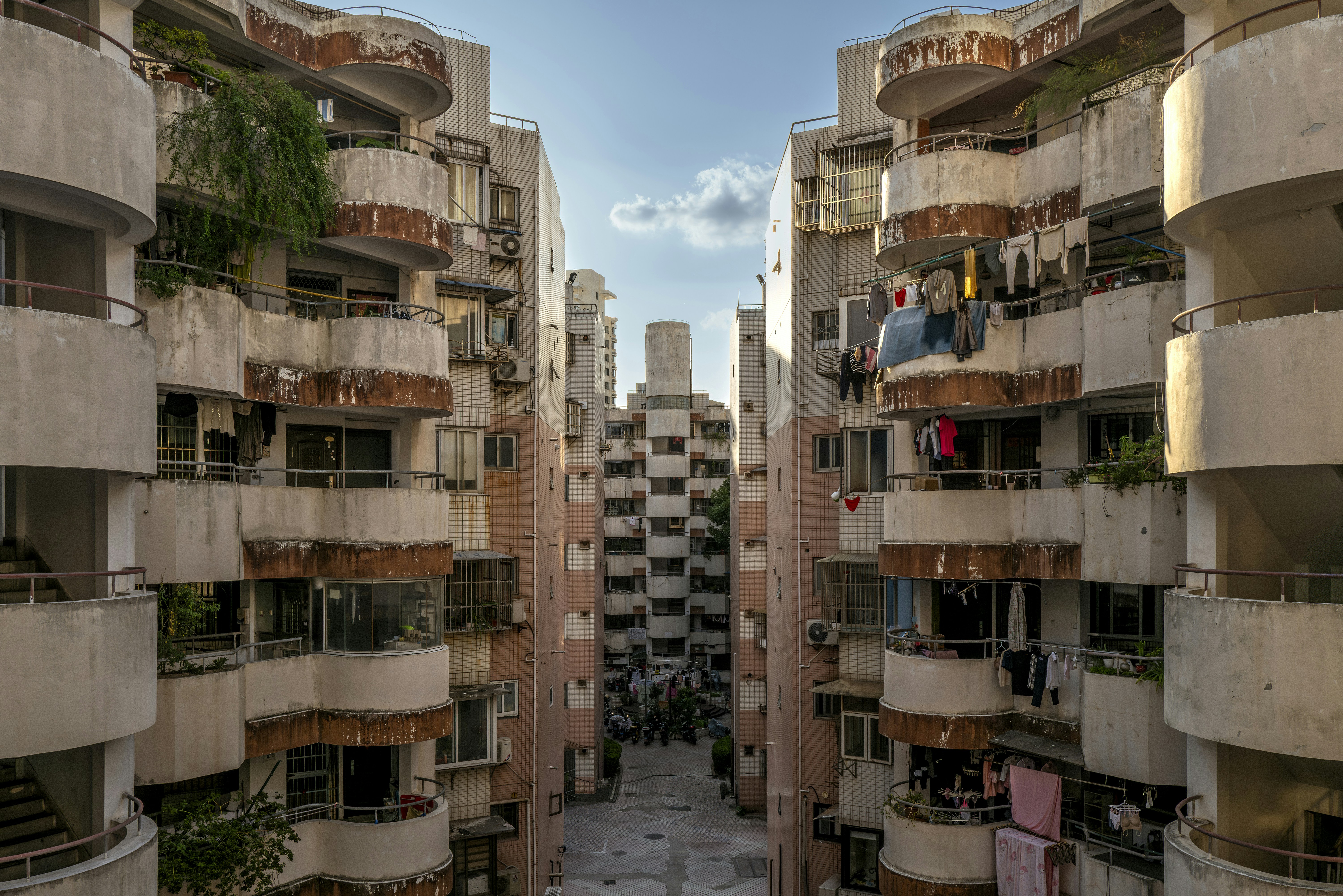 Apartment buildings with balconies and laundry hanging