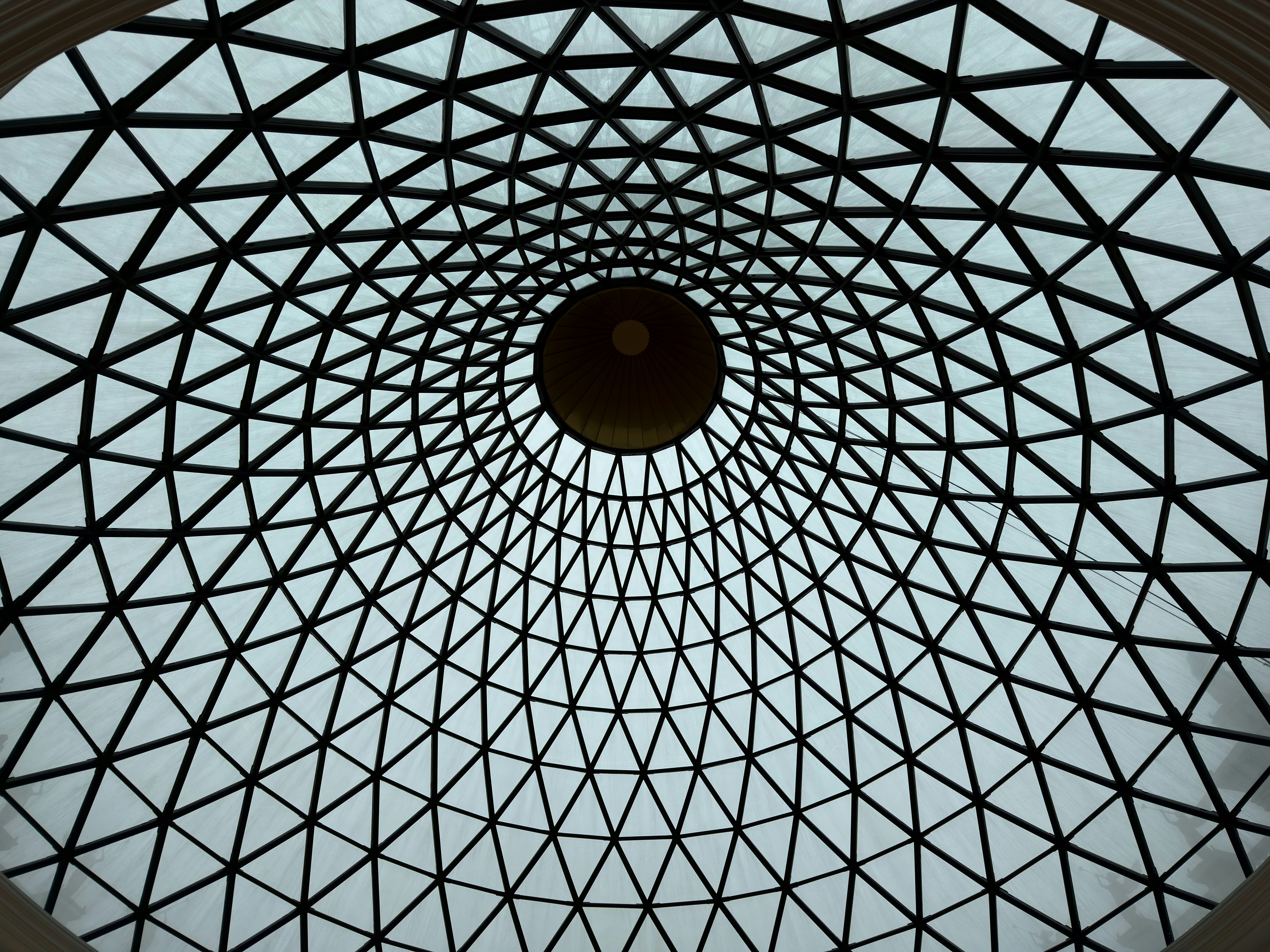 Geometric dome ceiling with a central light fixture.