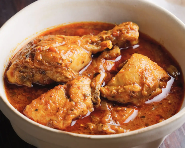 Chicken in Peanut and Tomato Sauce