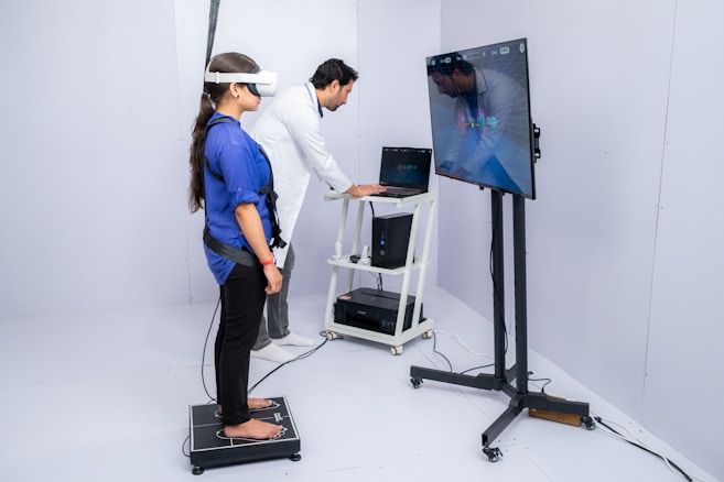 Woman uses vr headset for body scan with technician