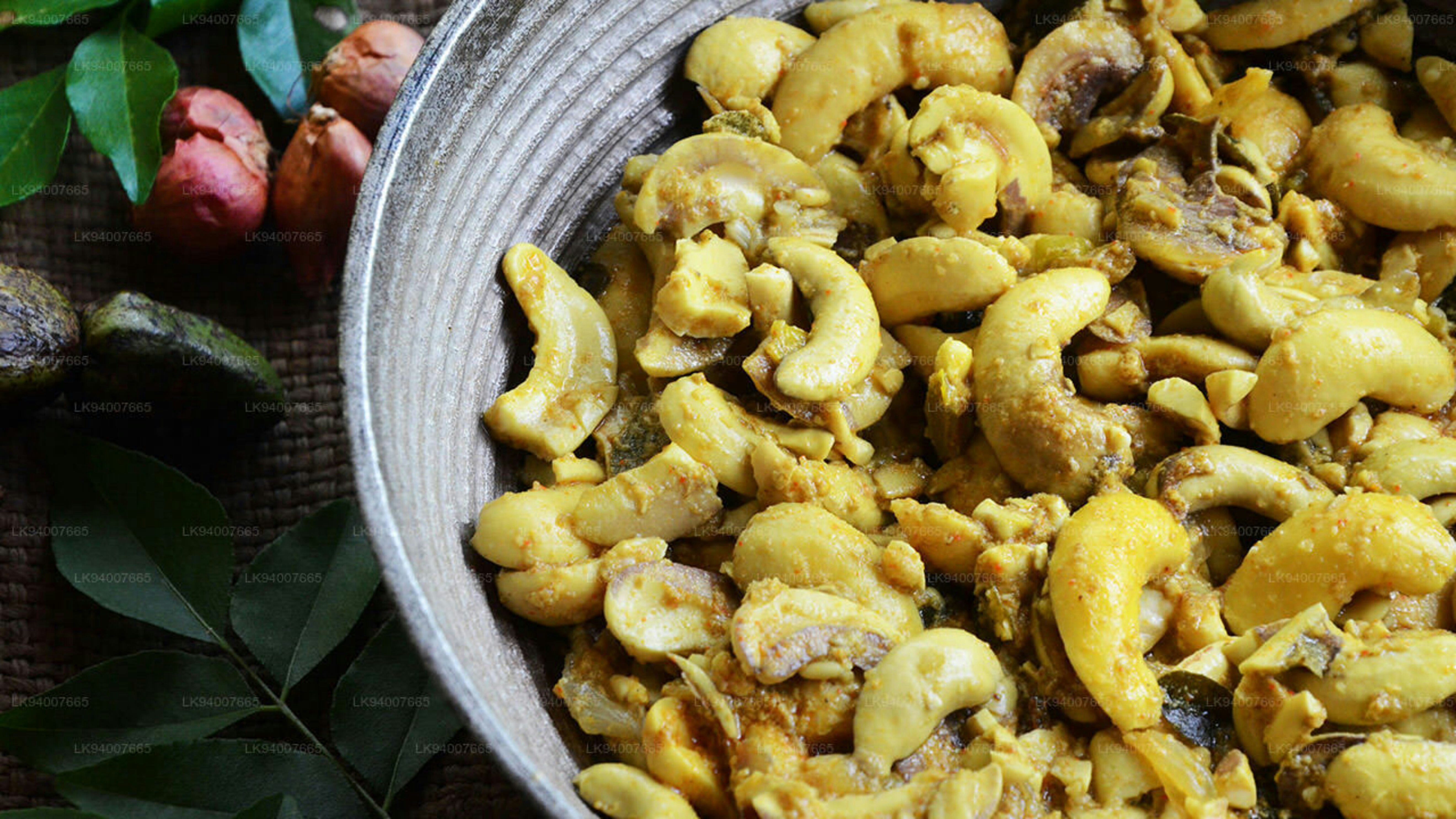 Bowl of cooked cashews with spices