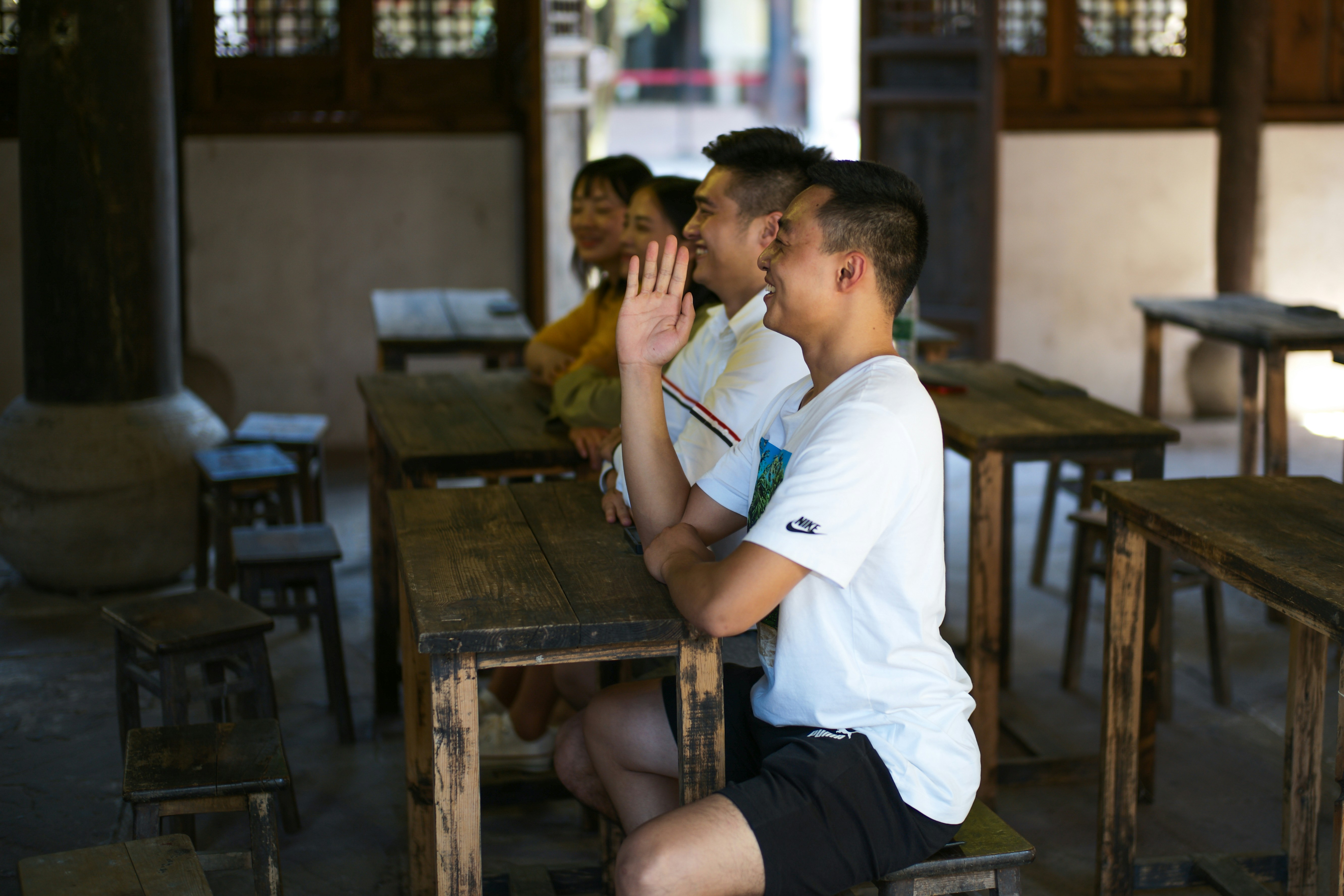 Students sitting at desks in a classroom