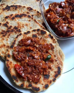 Flatbreads topped with spicy relish and savory relish