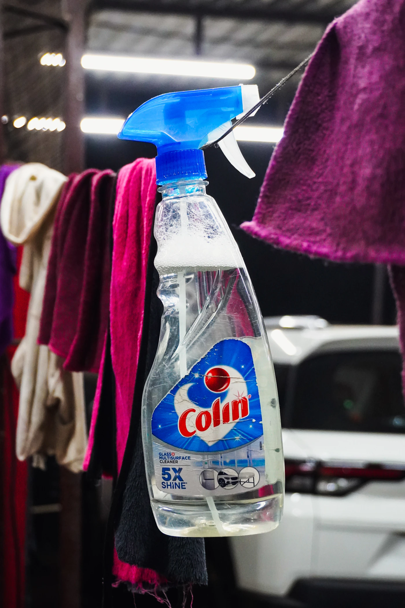 Cleaning spray bottle with reusable cleaning cloths
