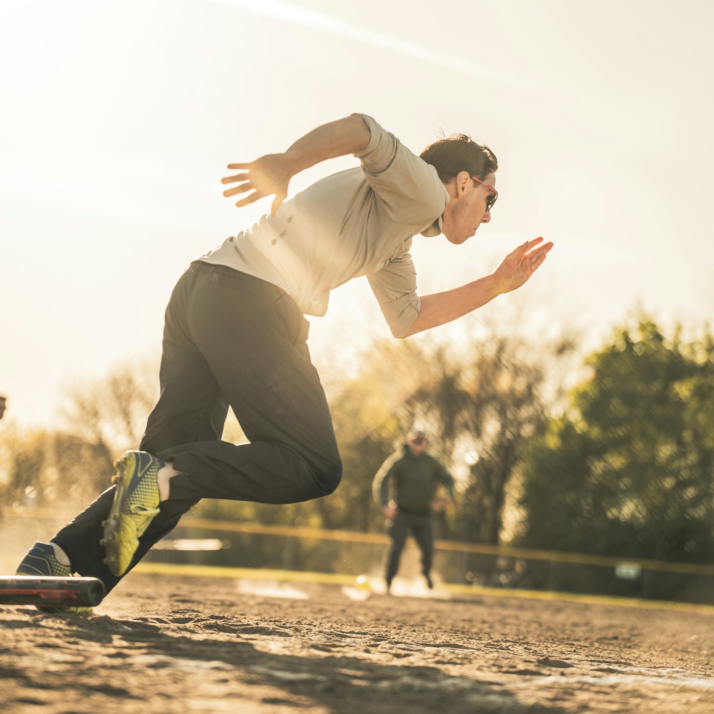 Athlete resting on track between sets