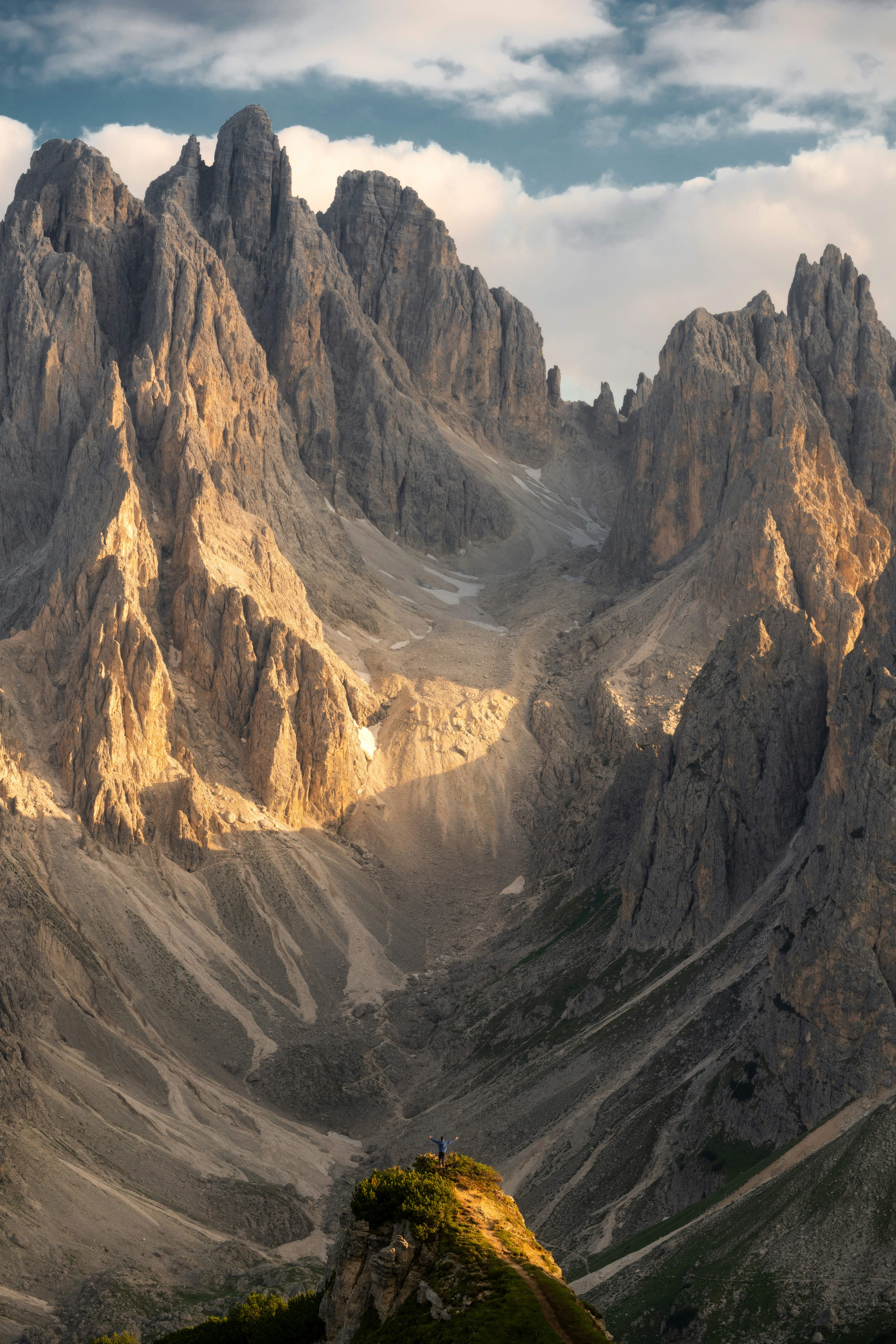 Jagged mountain peaks bathed in golden sunlight