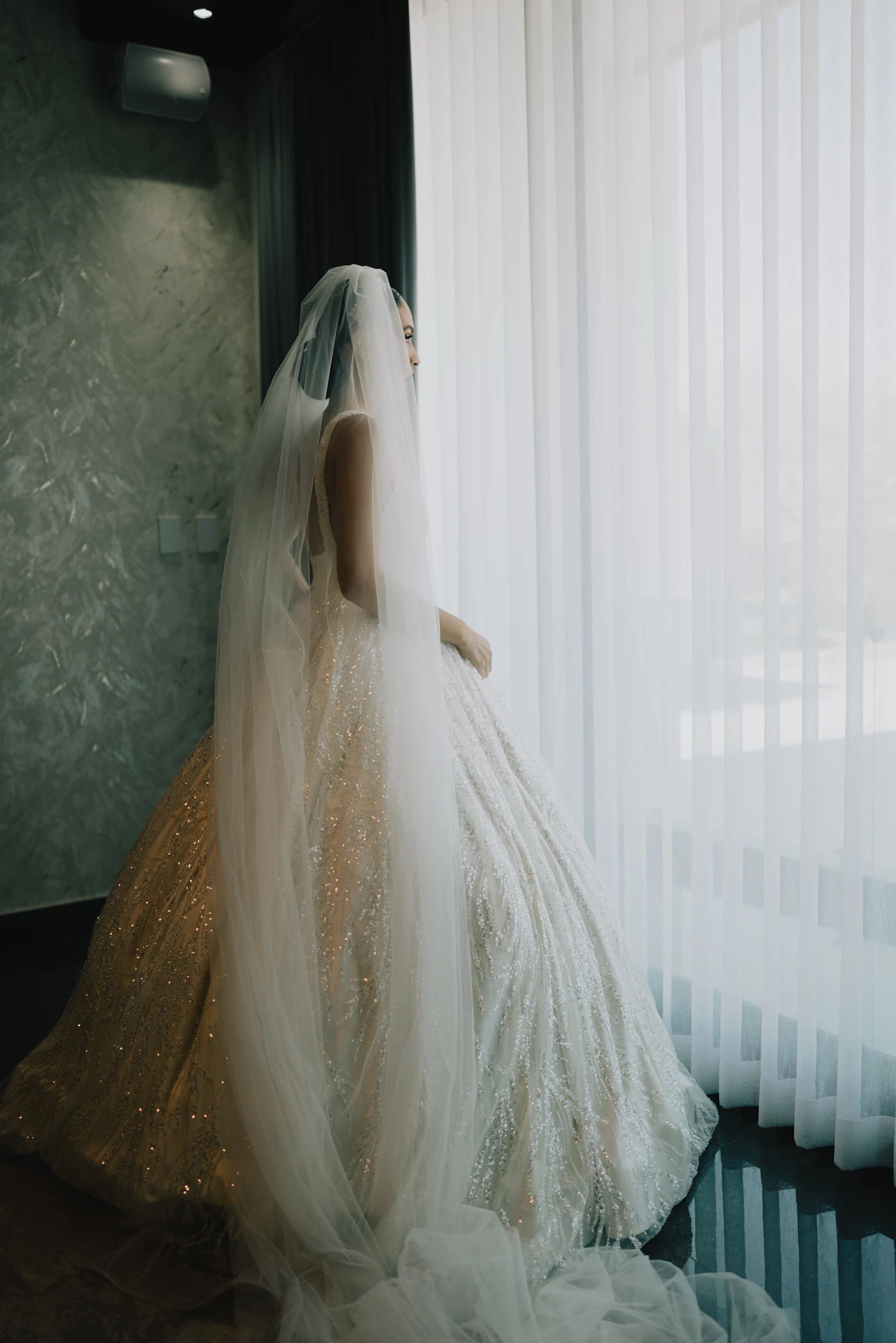 Stock photo: bridal portrait in tall window light — wedding day hero (illustrative only)
