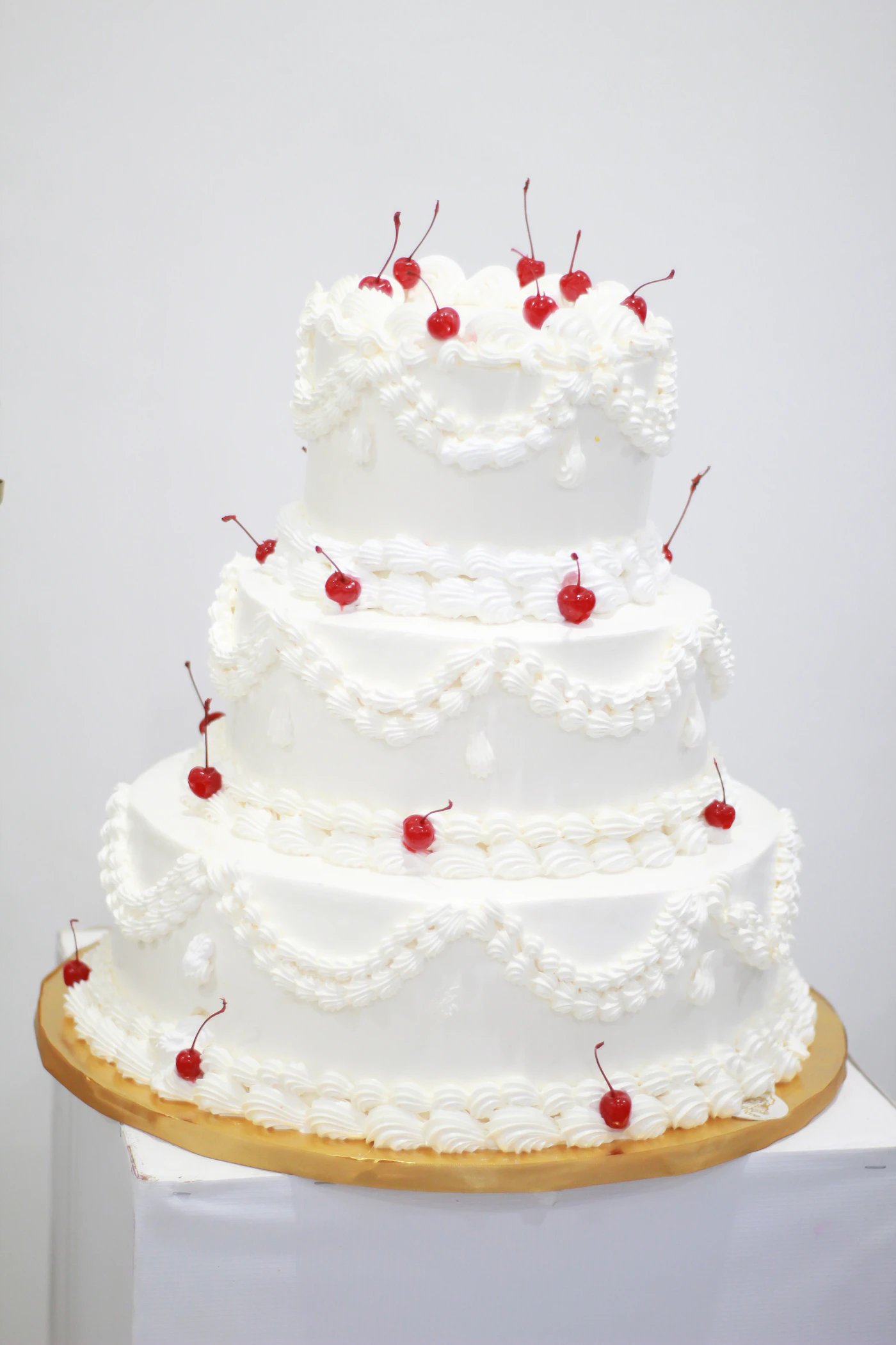 Tiered cake with cherries