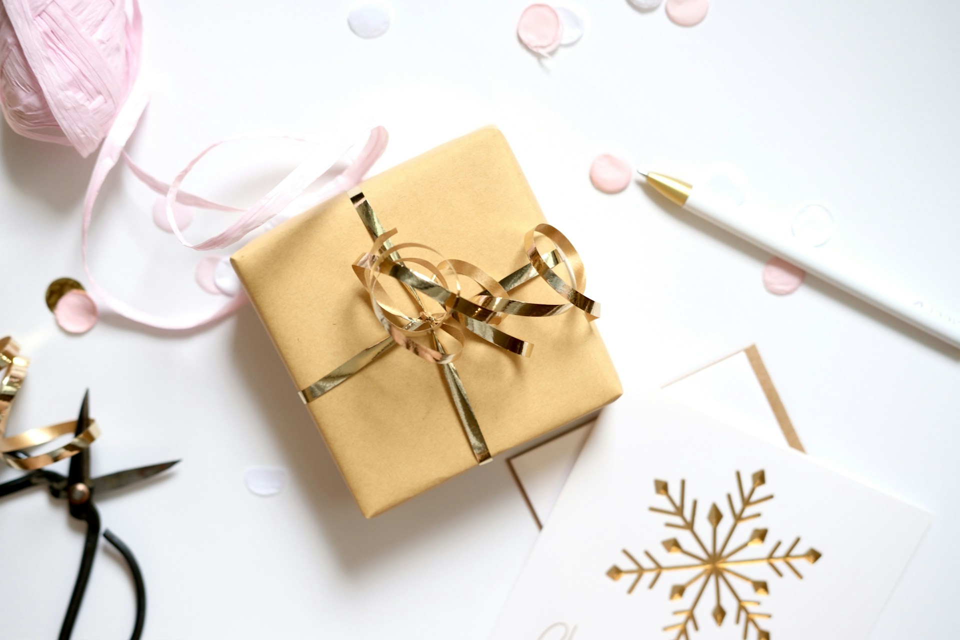 Gift wrapping supplies with present and snowflake card
