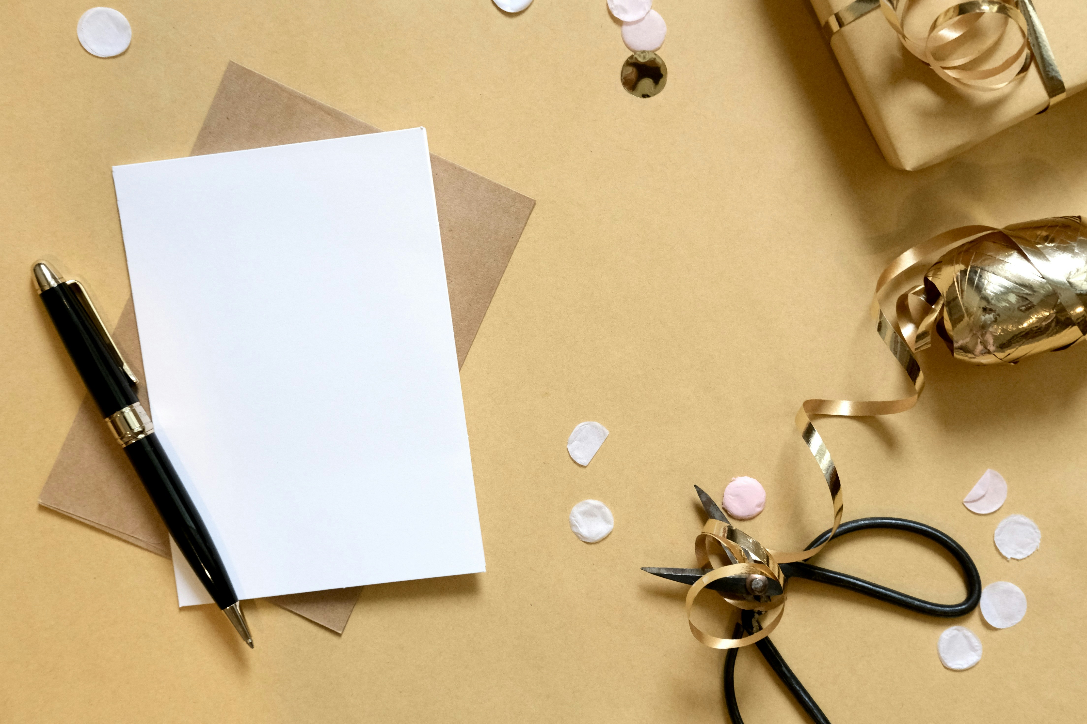 Blank card with pen and gift box