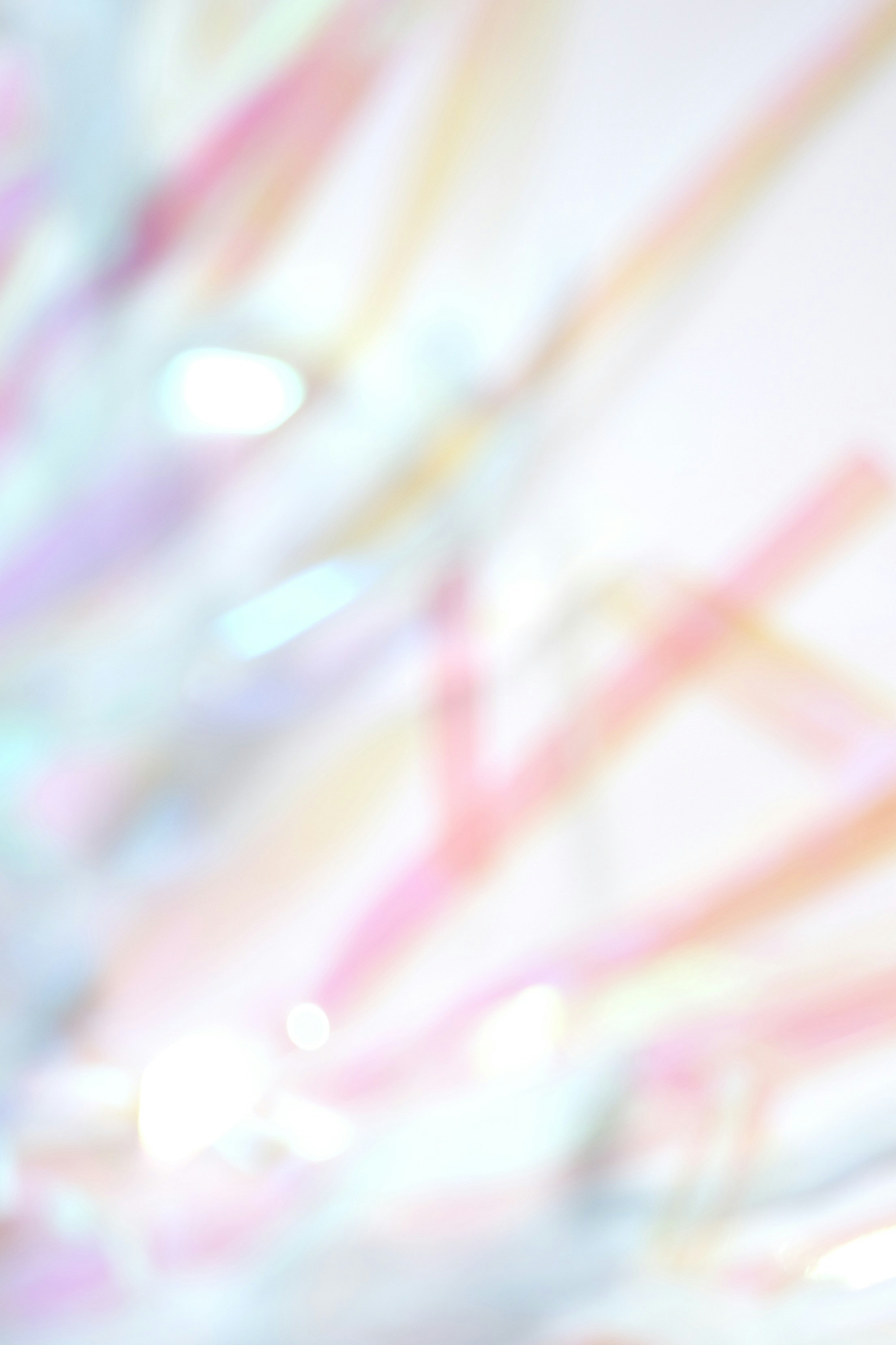 Soft pastel streamers with bokeh lights