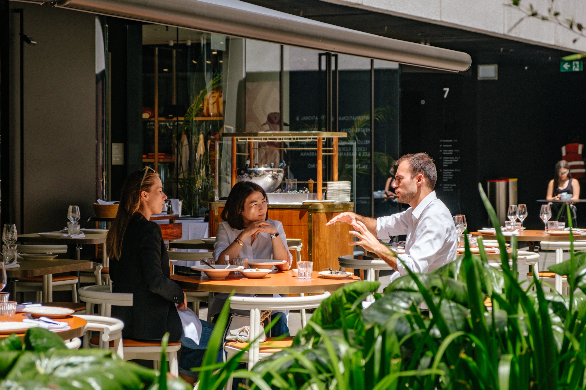People dining at an outdoor cafe