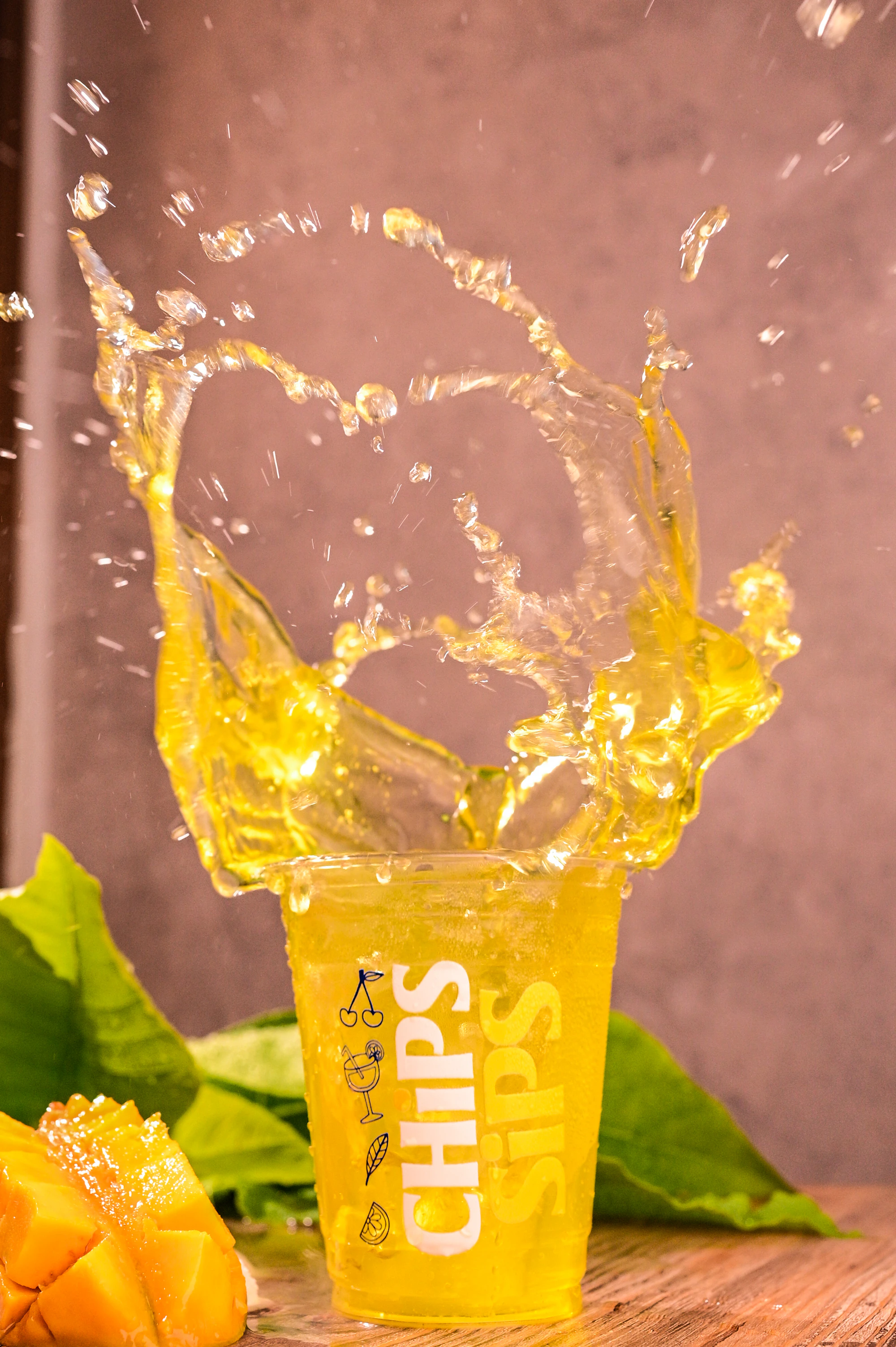 Juice bursting out of a glass