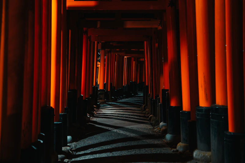 Vermilion torii gate path at Fushimi Inari Shrine in Kyoto