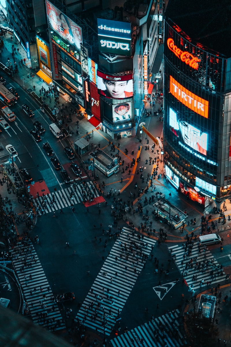 Shibuya Crossing at night with illuminated billboards, Tokyo