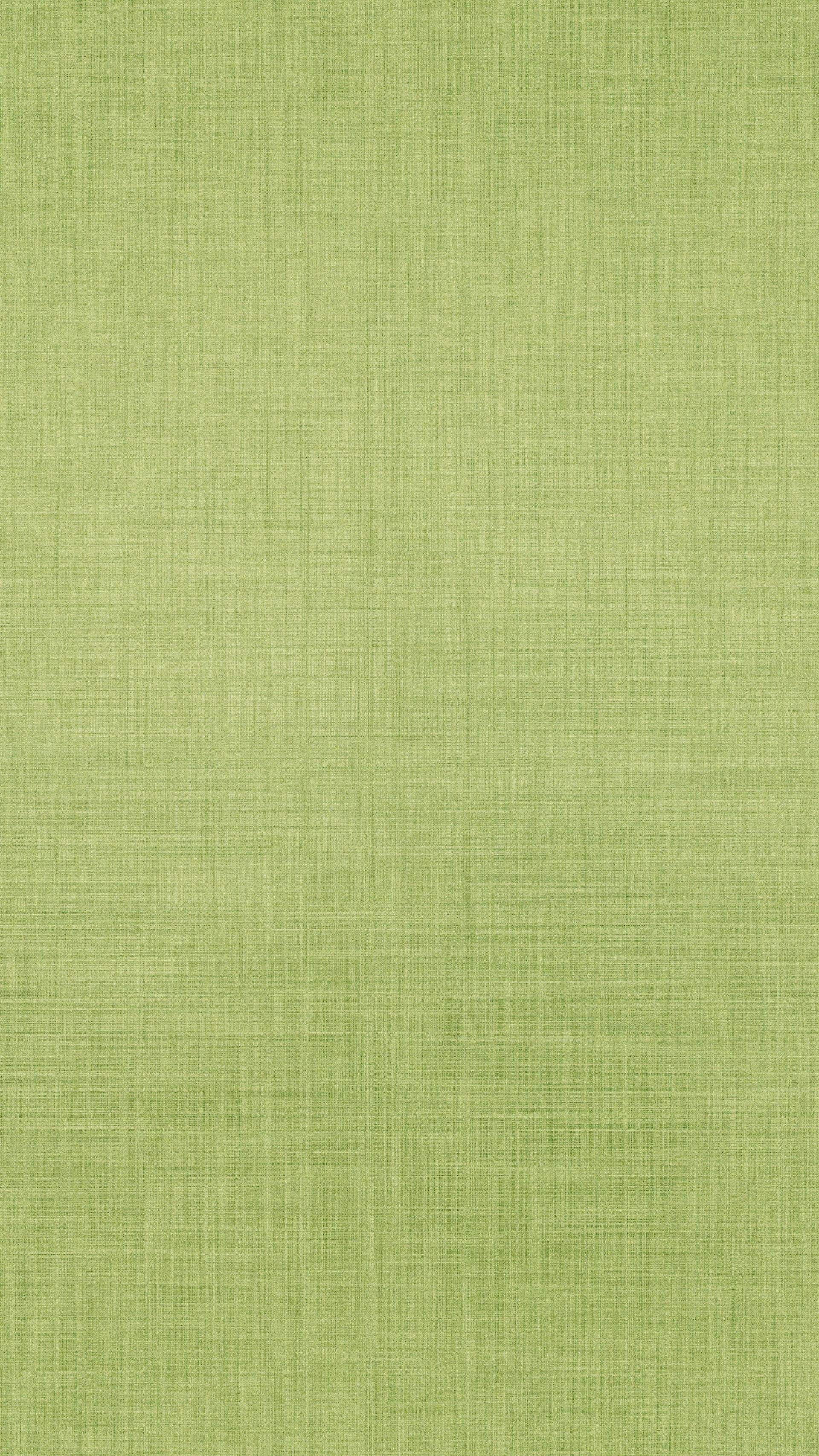 A textured light green fabric background