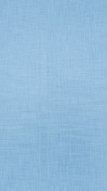A light blue textured fabric background