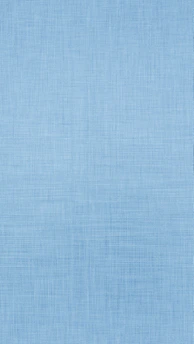 A light blue textured fabric background