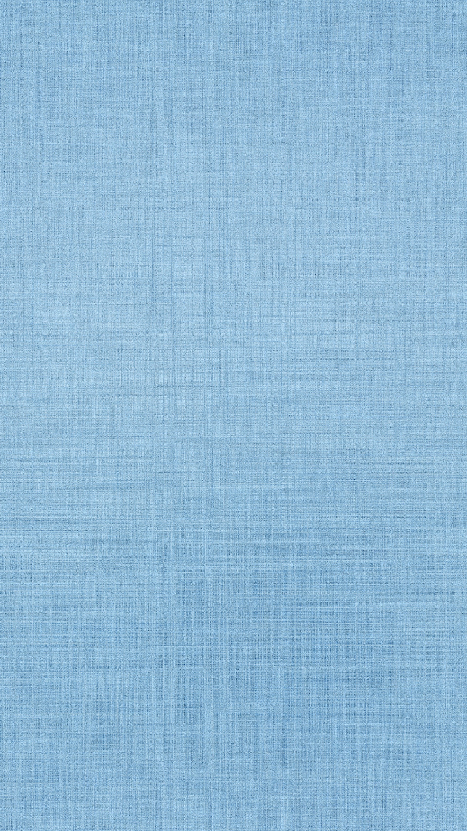 A light blue textured fabric background