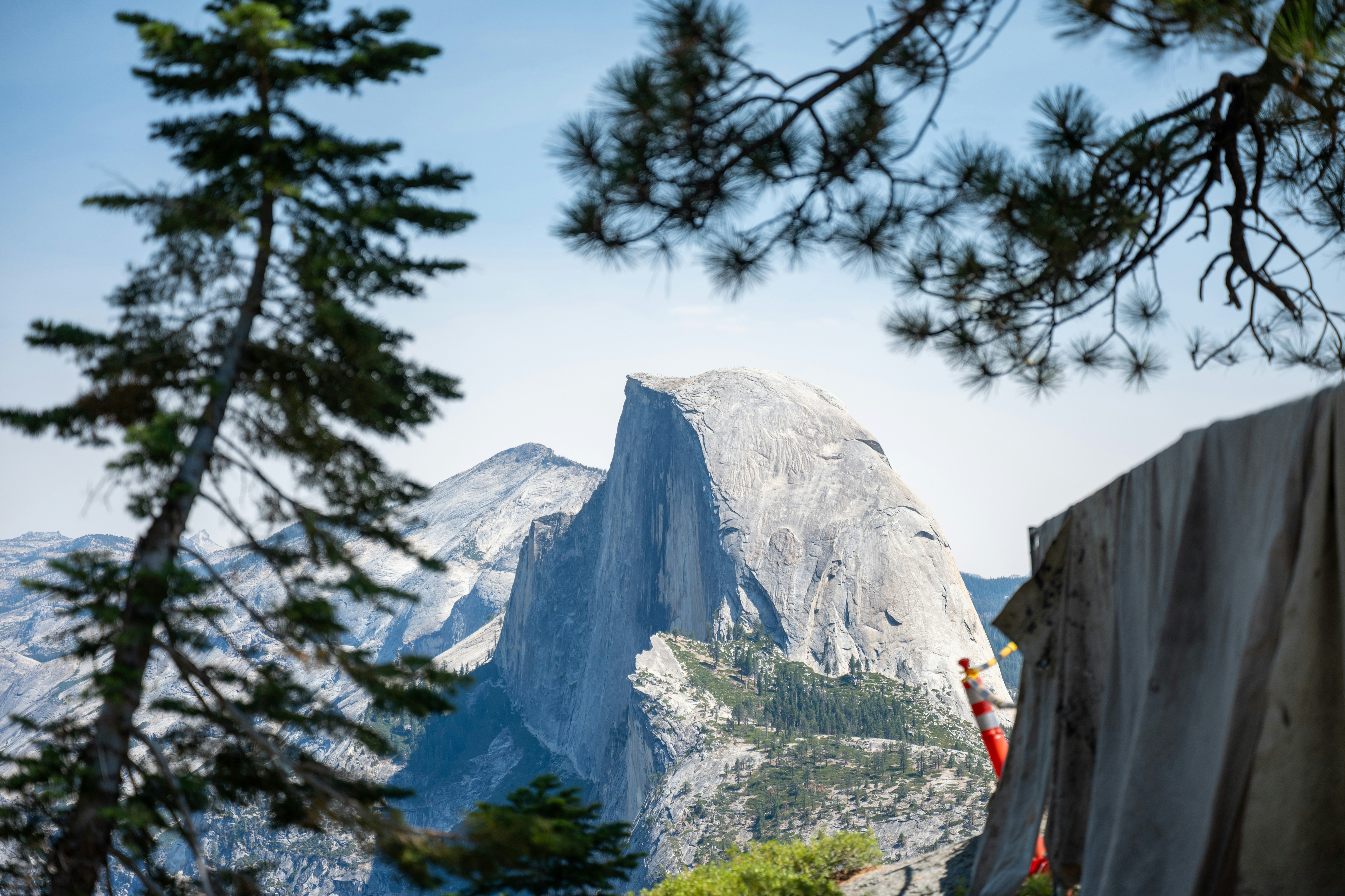Climber scaling half dome in yosemite national park
