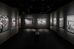 Black and white art gallery with framed photographs