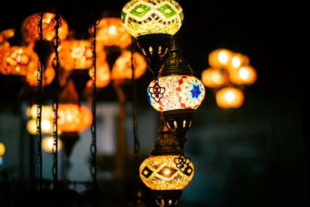 Colorful mosaic lanterns hanging in the dark