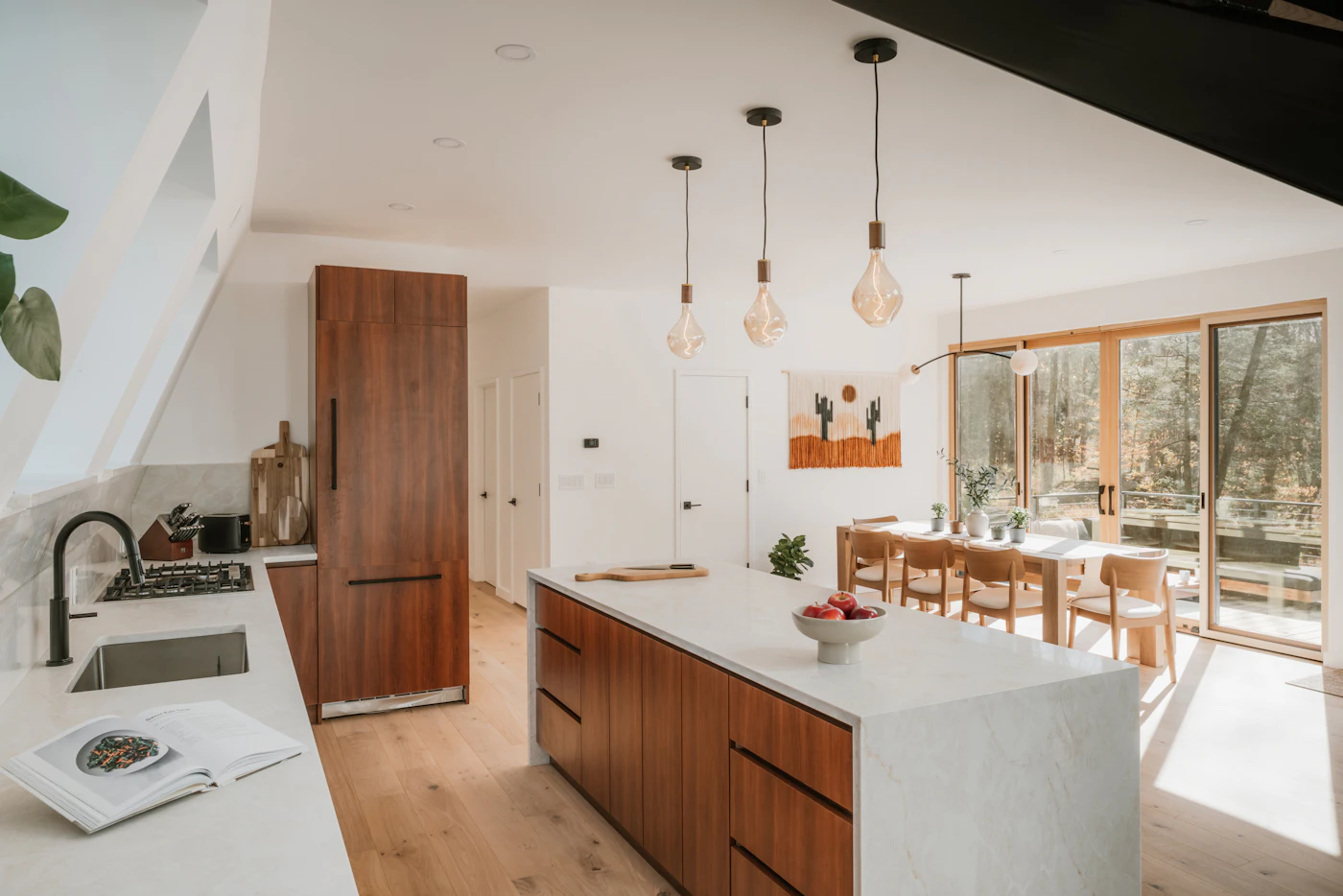 Same kitchen space after Haniya renovation, new island and cabinetry