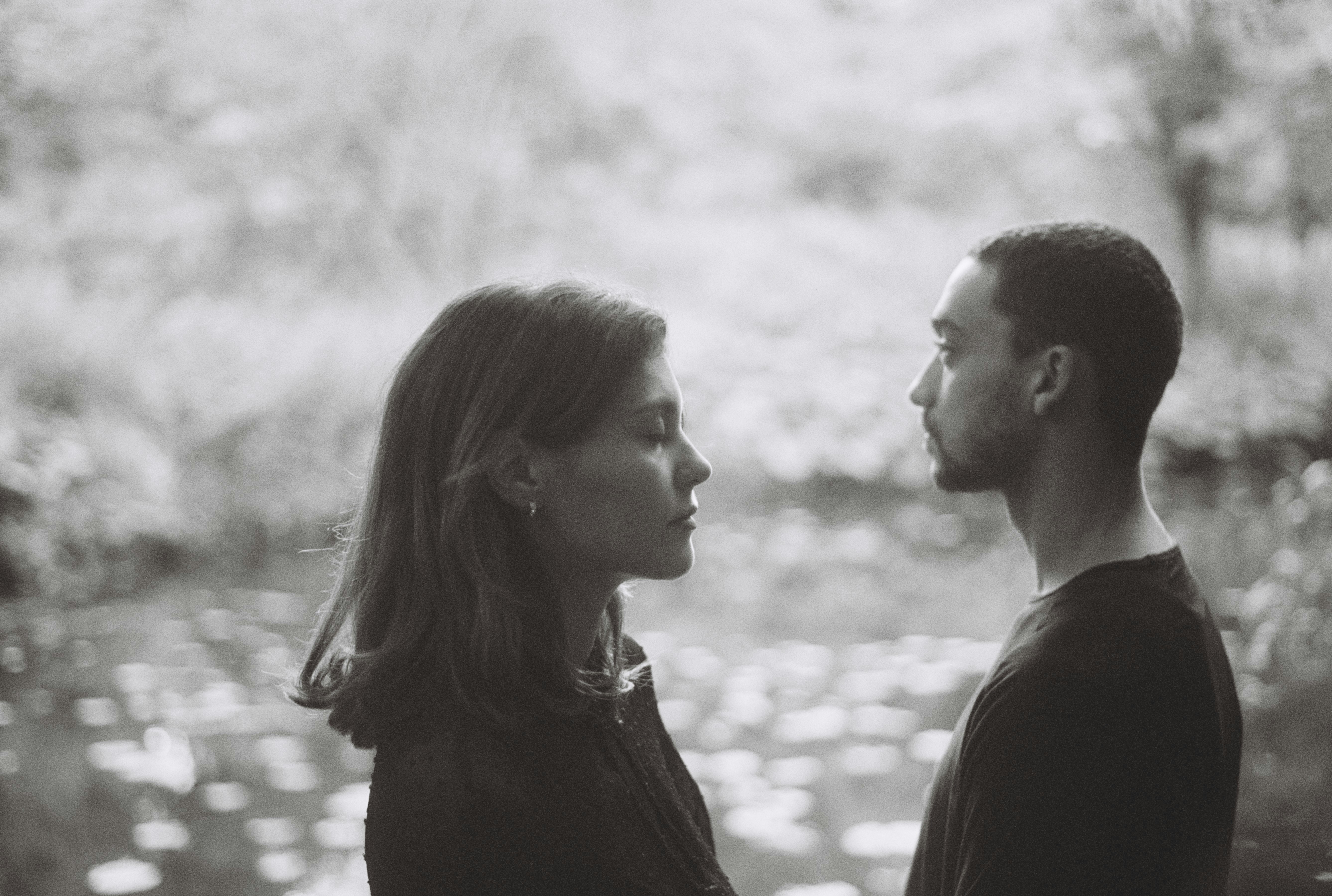 Couple looking at each other with serene background