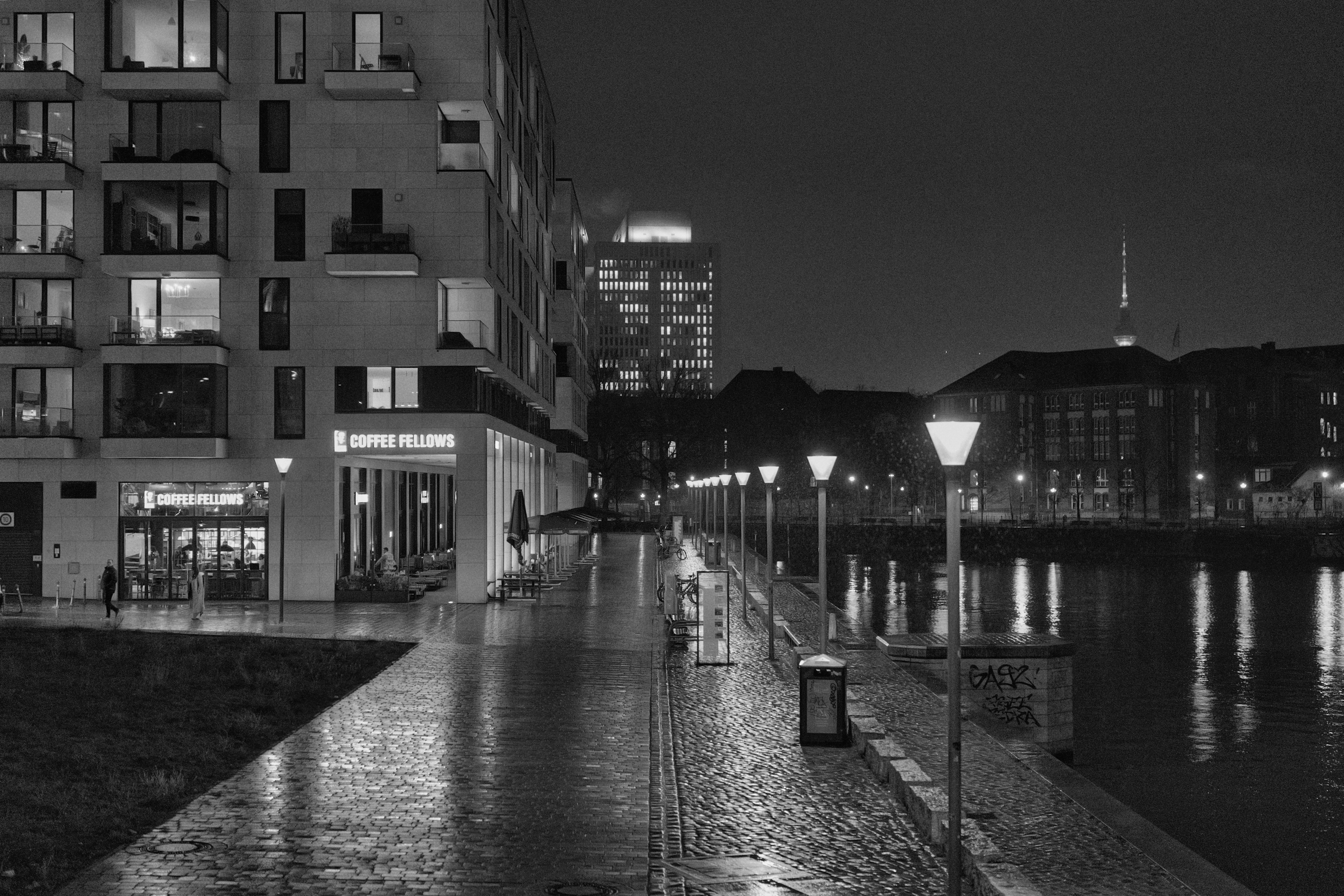 Wet city street at night with building reflections - wet-city-street-at-night-with-building-reflections-bf-NGjhKvjc