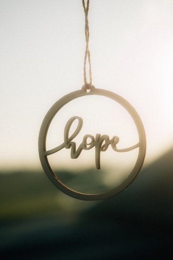 Wooden circle ornament with the word hope