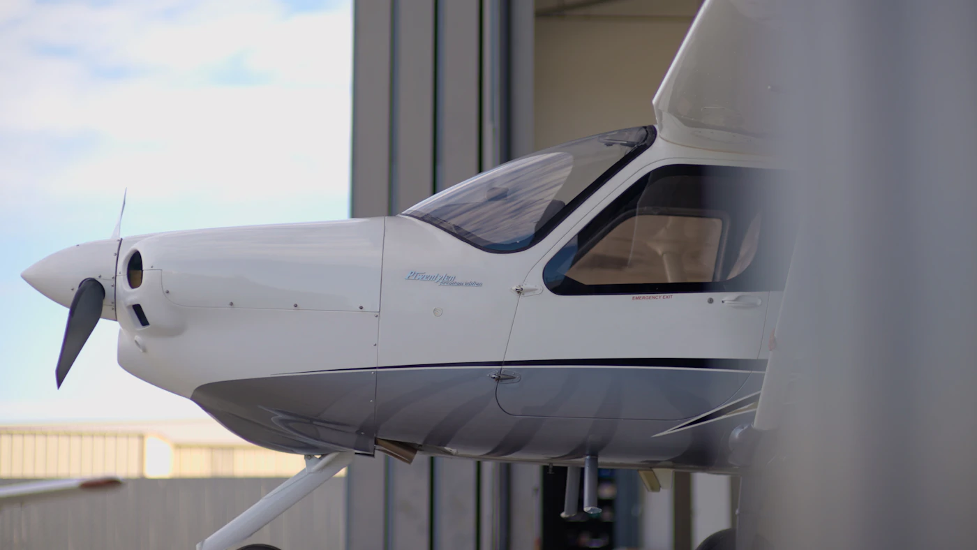 Aircraft parked in a hangar