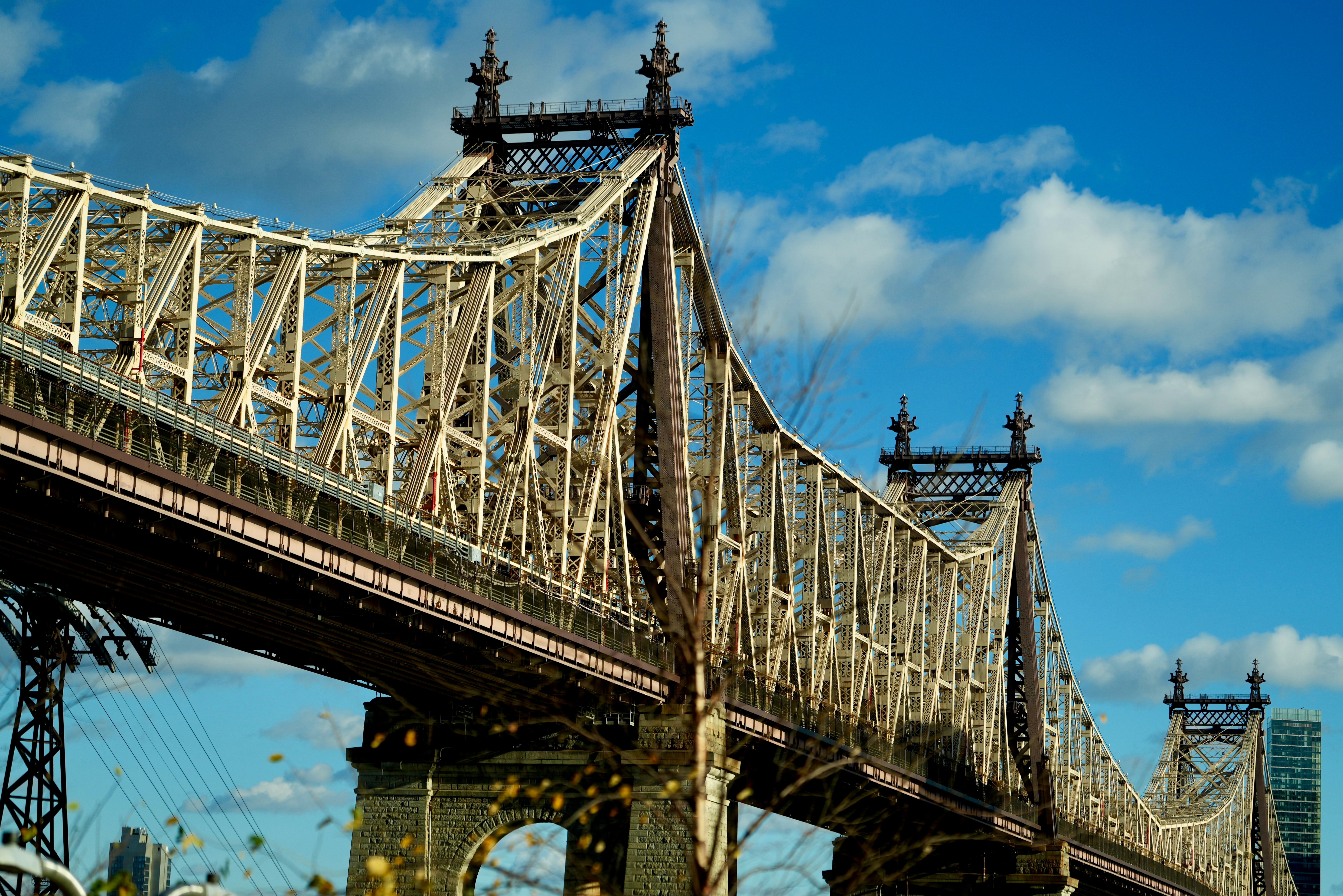 Queensboro bridge under a cloudy blue sky