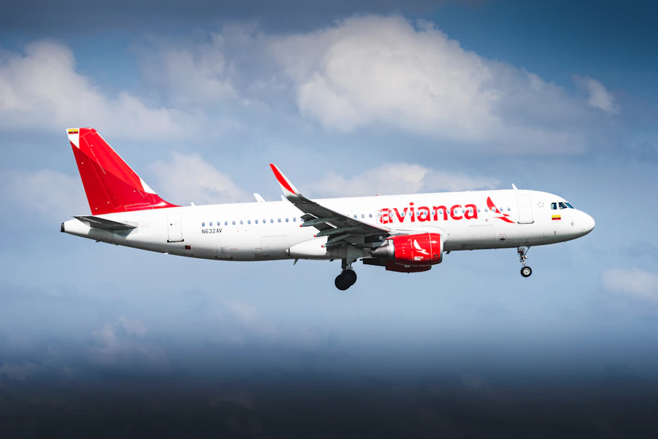 Avianca airplane flying in the sky of Pereira