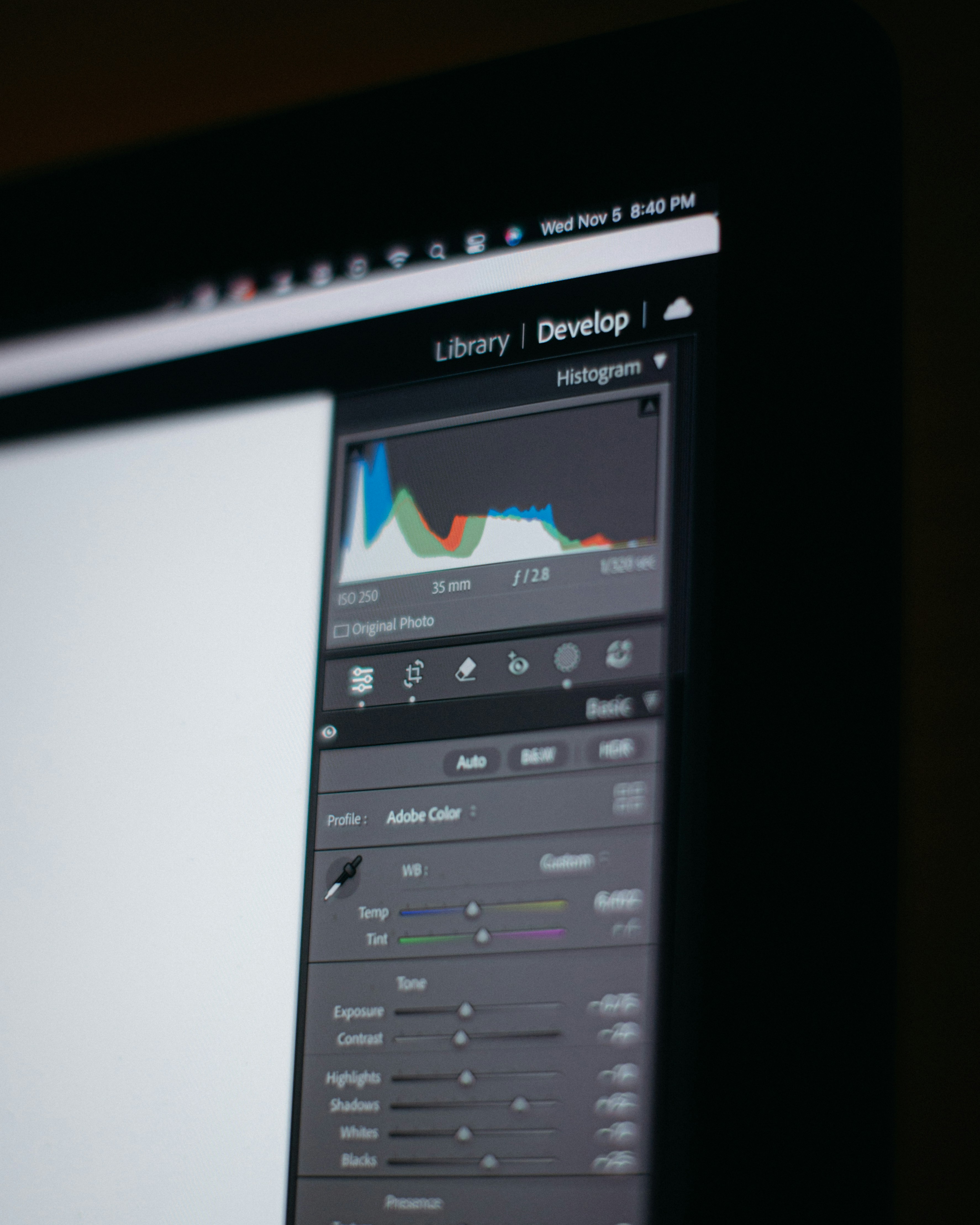 Computer screen displaying editing software interface with histogram.