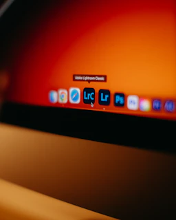 Computer screen showing adobe lightroom classic application icons.