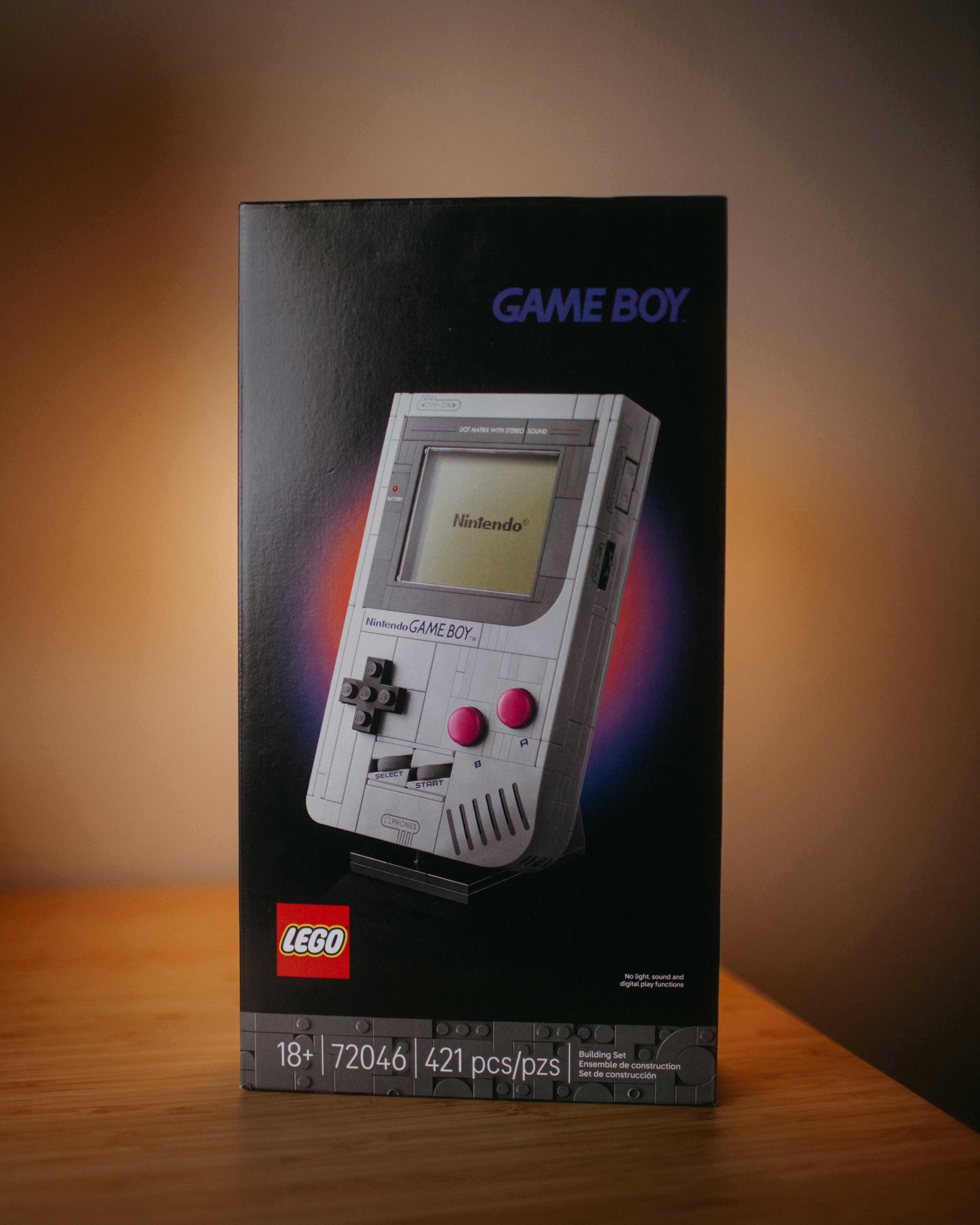 Lego game boy set box with vintage gaming console.