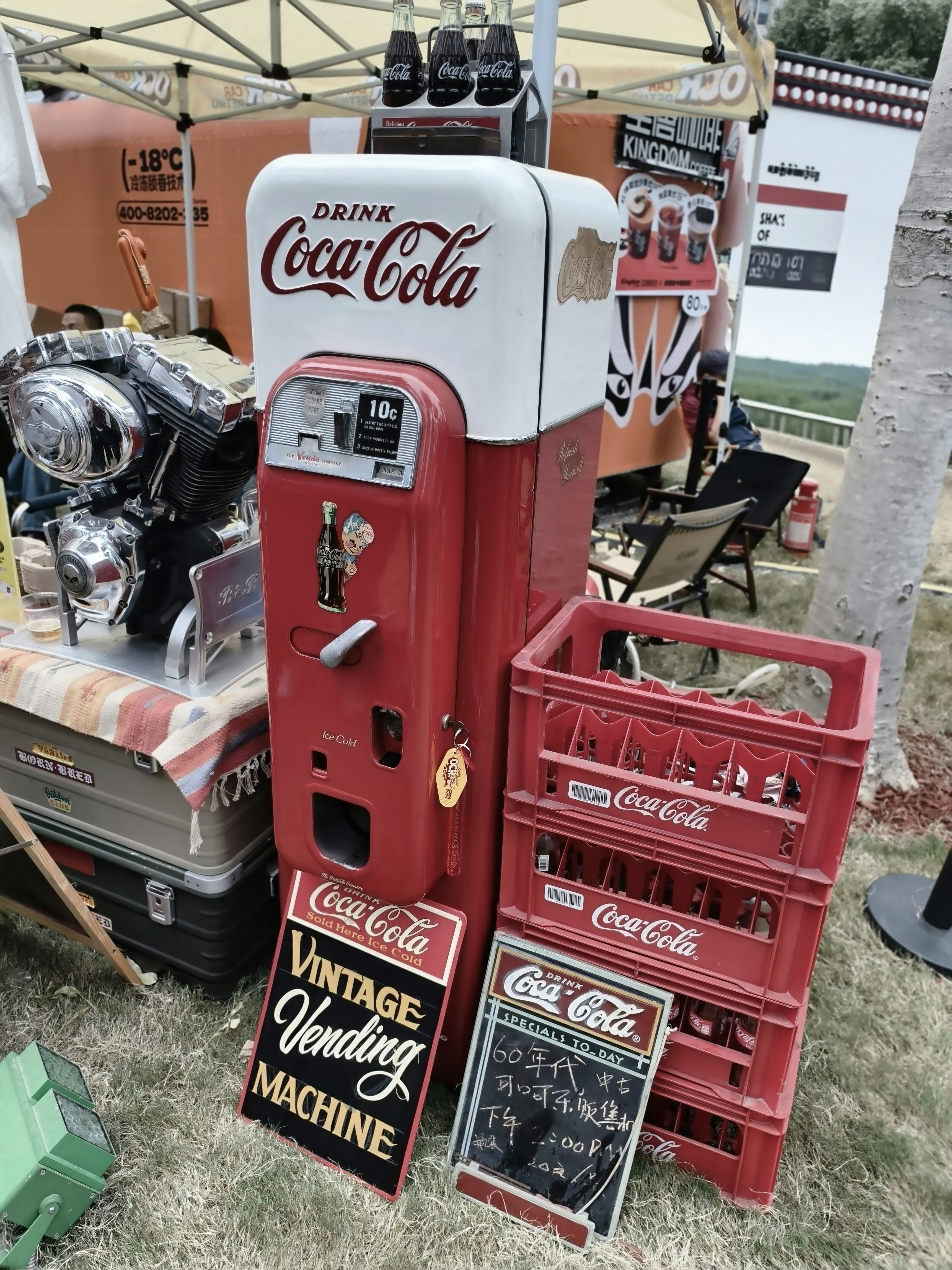Vintage coca-cola vending machine with crates