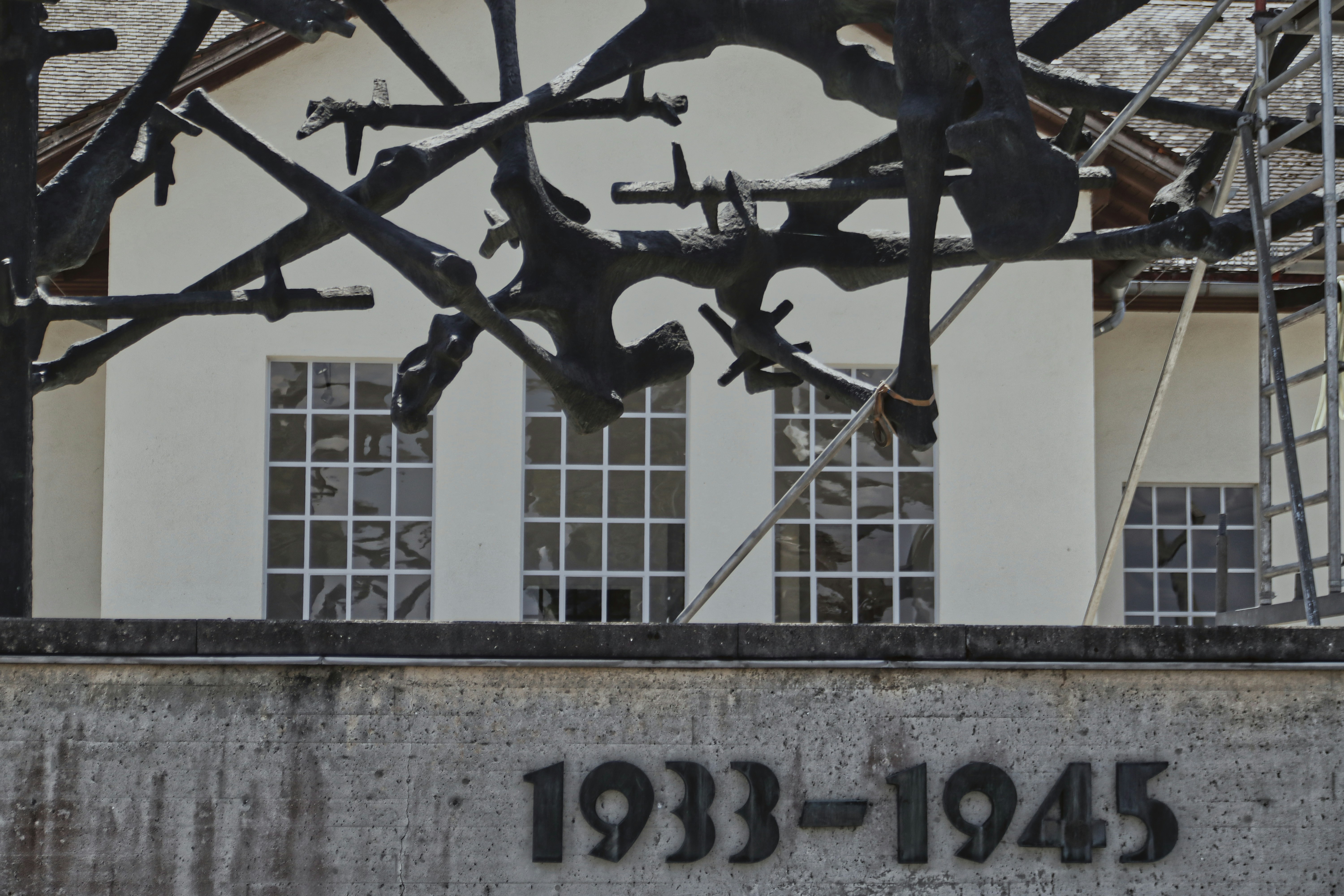 The "1933–1945" inscription and memorial sculpture at the Dachau Concentration Camp Memorial Site