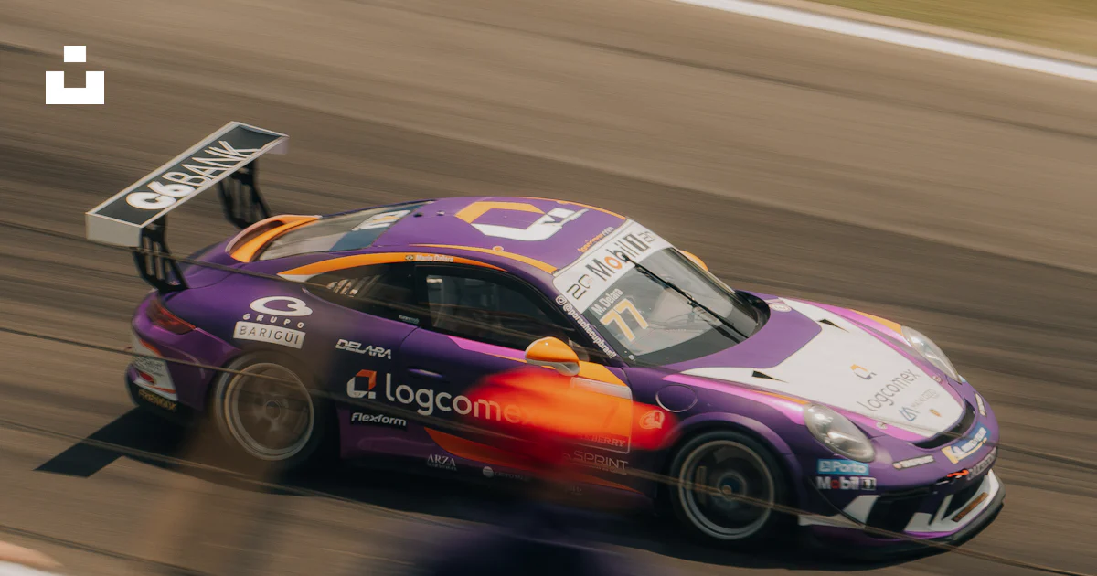 Purple Car Racing Purple race car speeding on a track photo – Free Sports car Image on ...