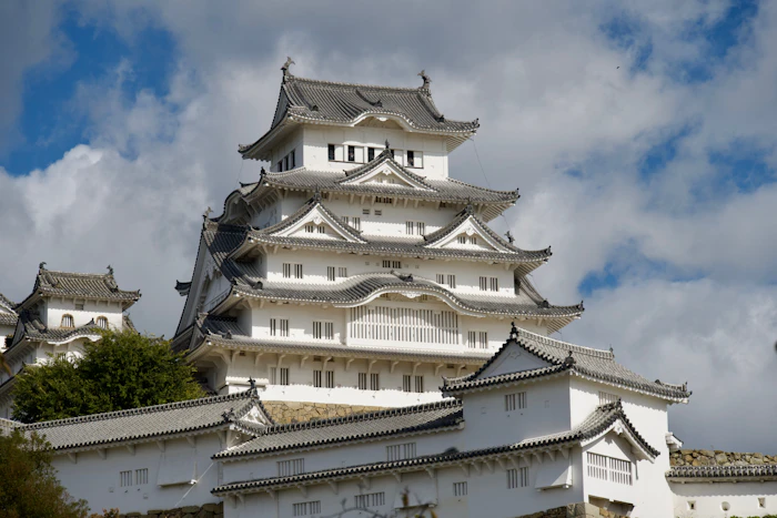 White walls and layered roofs of a Japanese castle