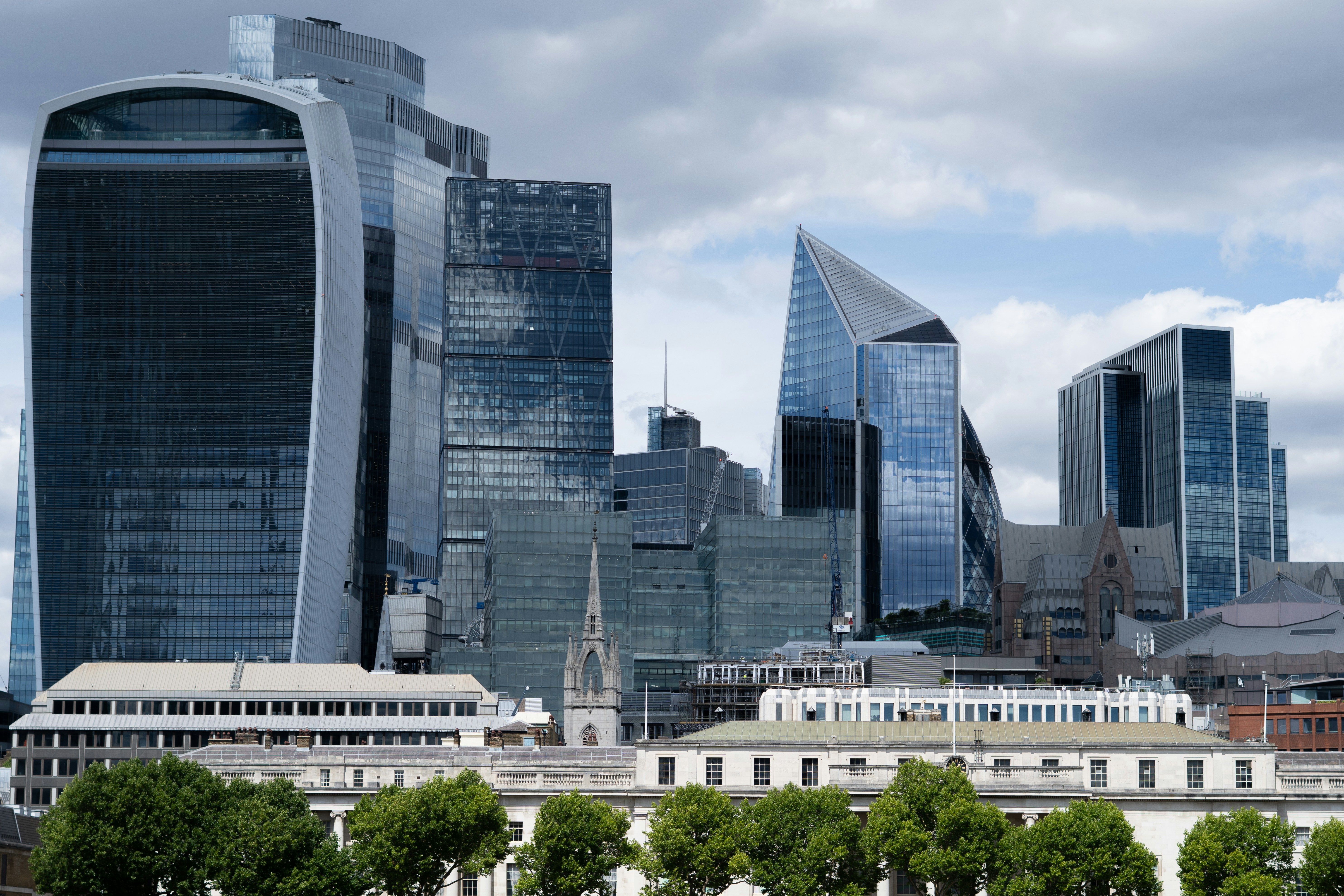 Modern skyscrapers dominate a city skyline.