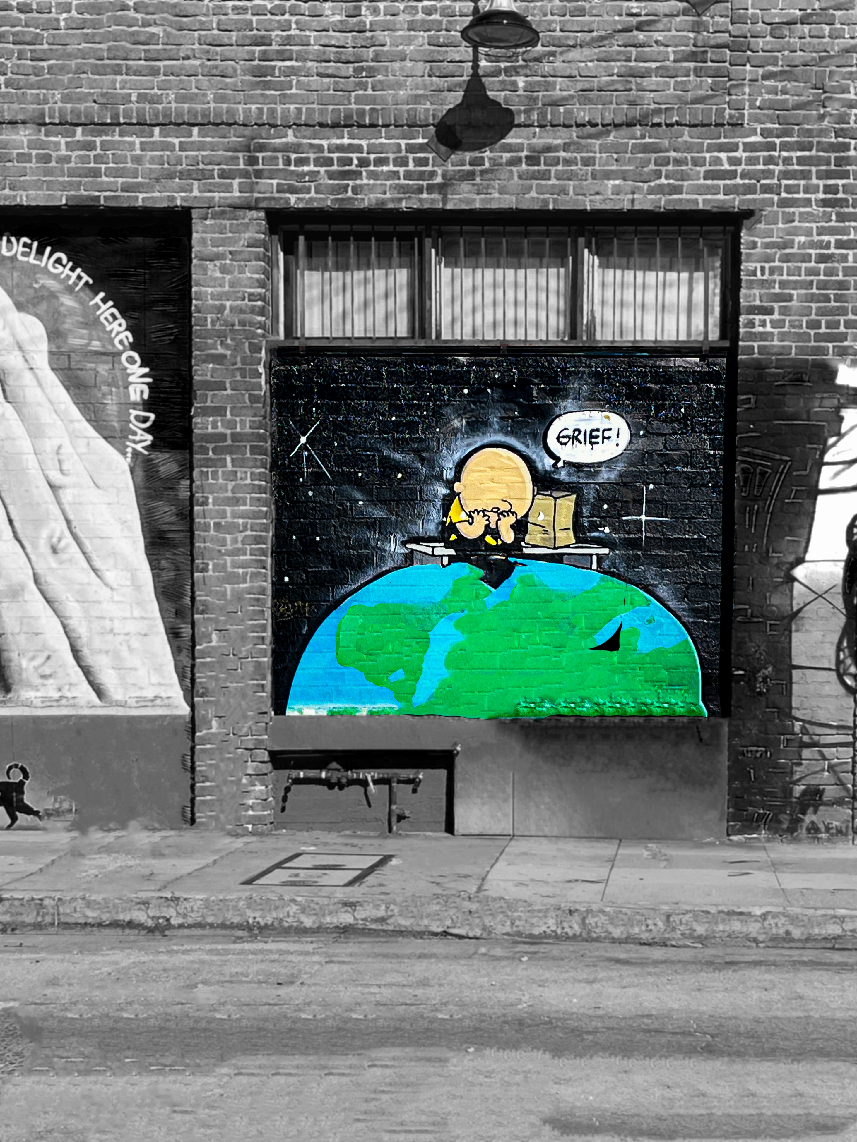 Graffiti art of a character on a planet