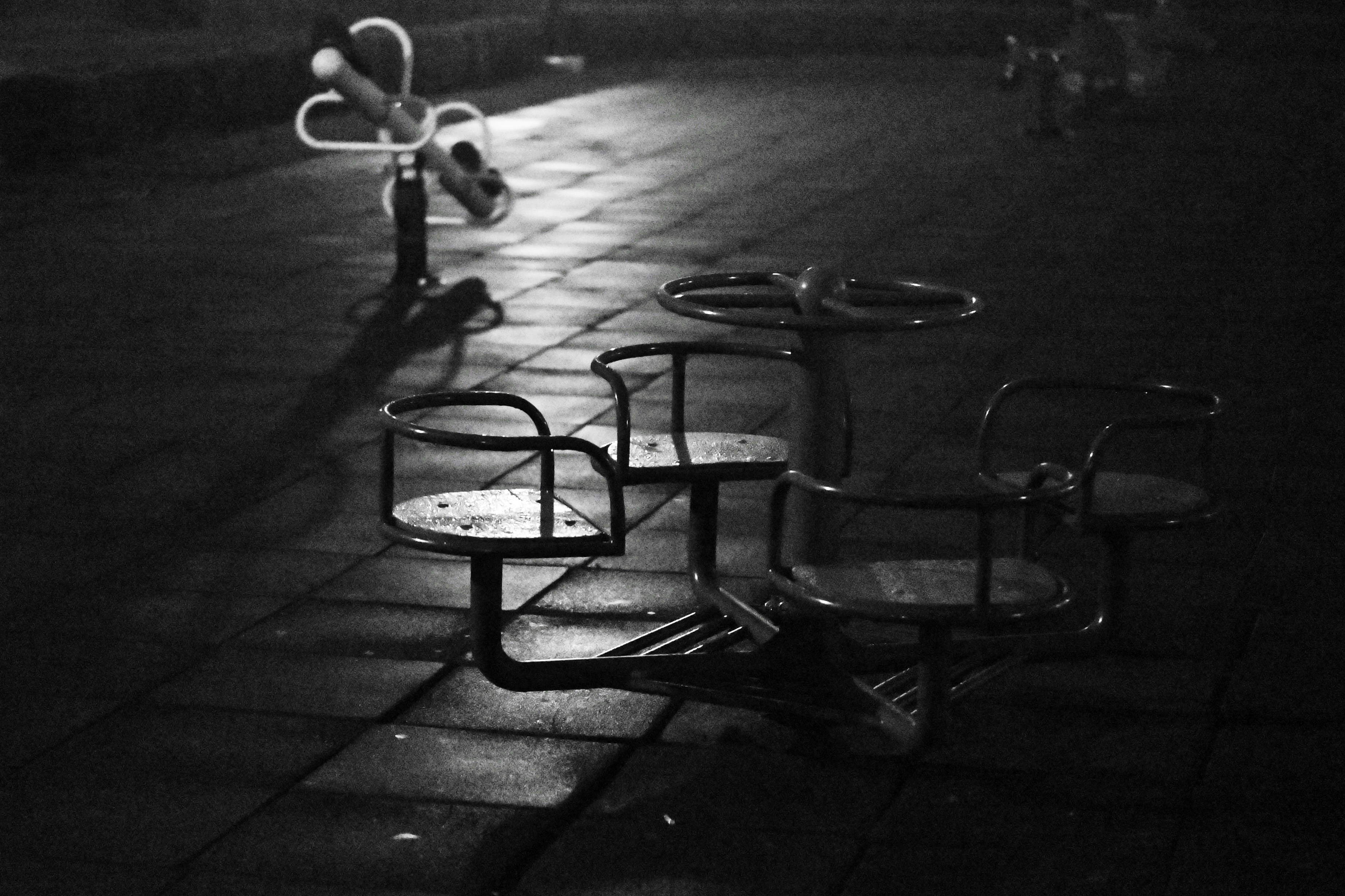 Empty playground equipment at night