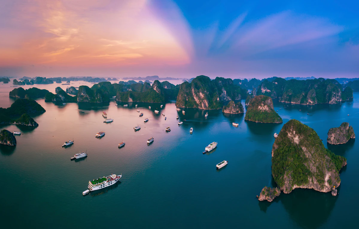 Karst islands in the ocean at sunset