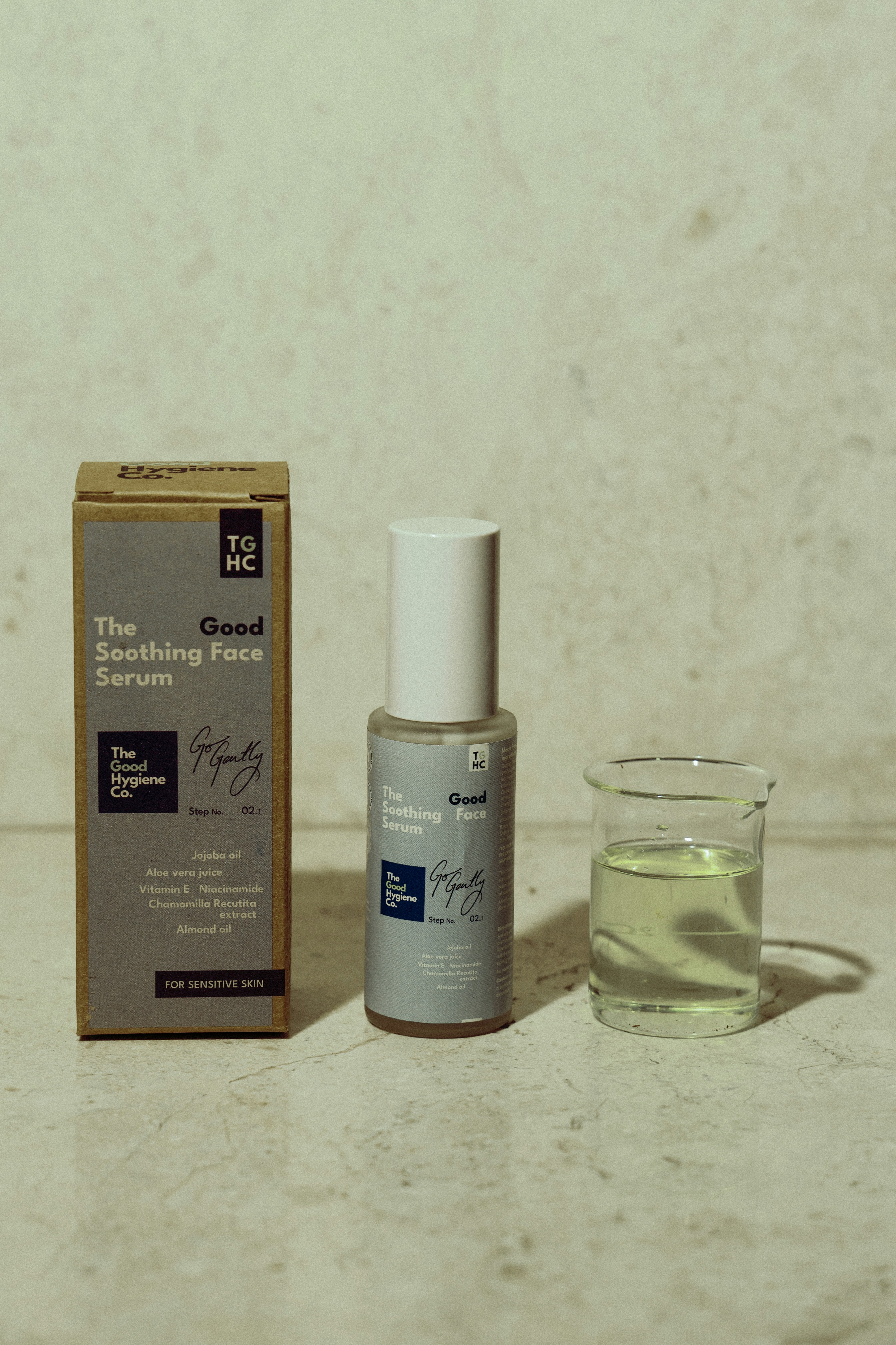 Skincare serum bottle with box and liquid sample